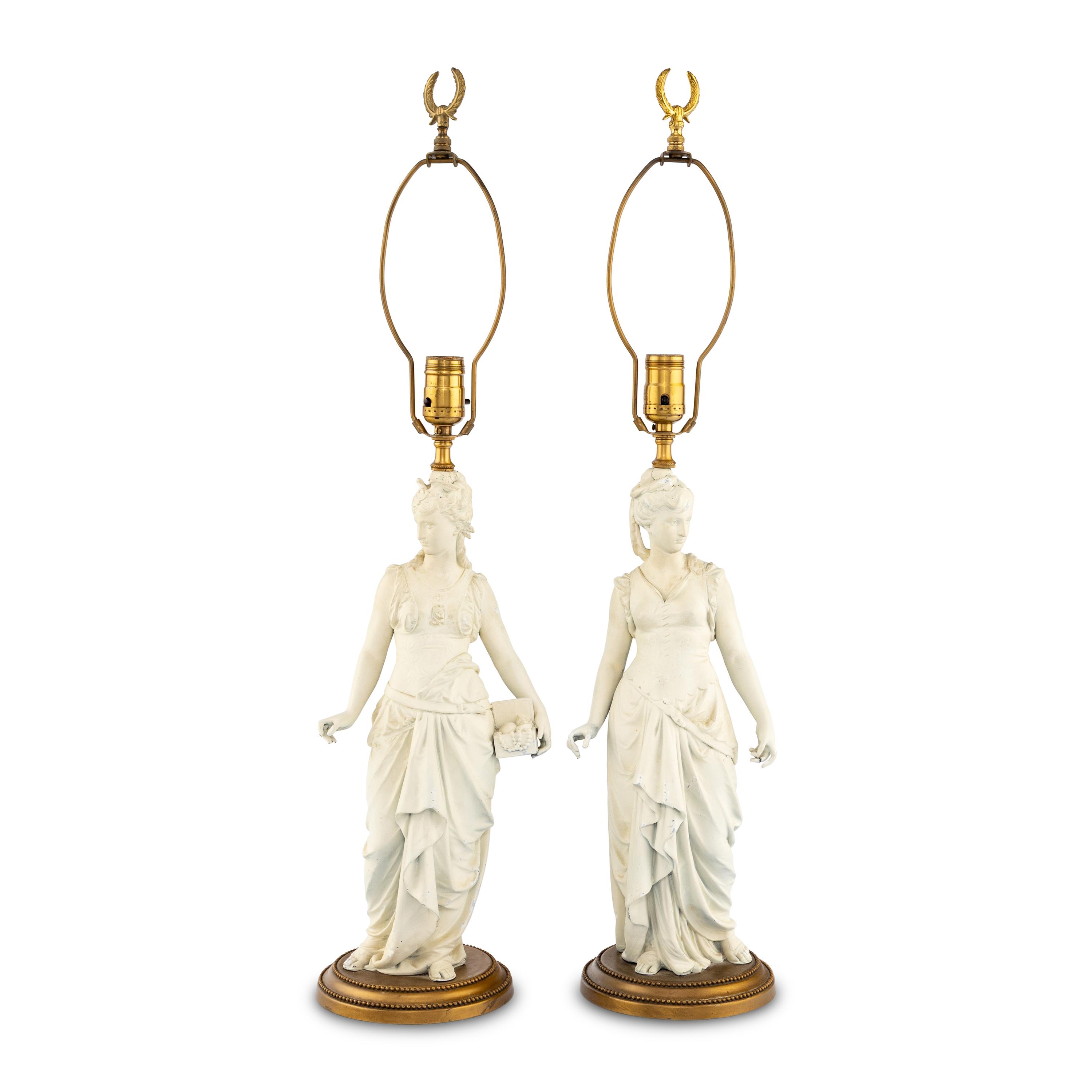 A Pair of White Painted Cast Metal Figures Mounted as Lamps