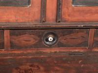 A Country Red and Grain Paint Decorated General Store Dry Goods Storage Cupboard