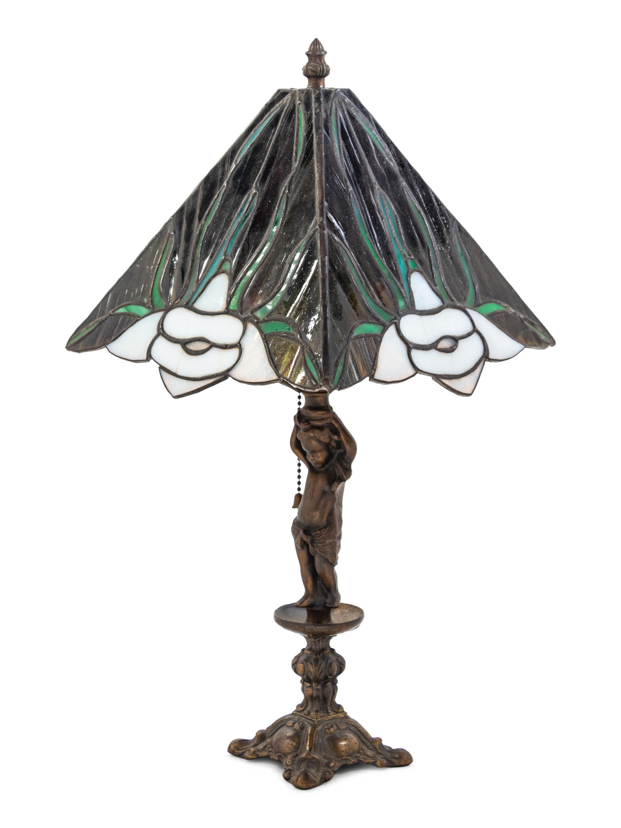 An American Leaded Glass and Cast Metal Figural Lamp