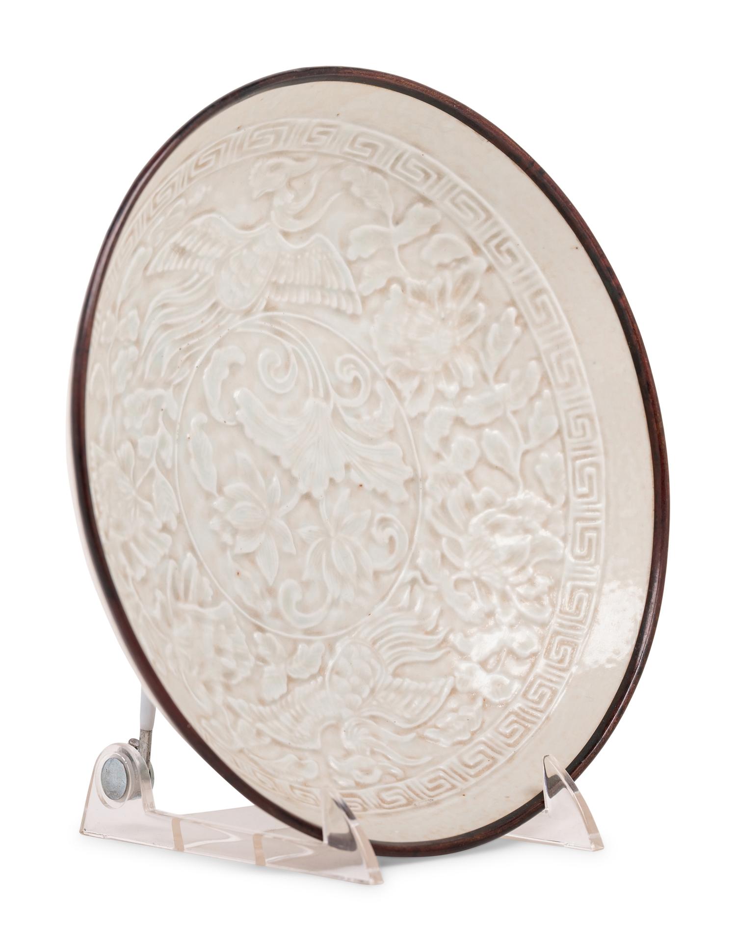 A Chinese Dingyao Style White Glazed Molded Porcelain Bowl