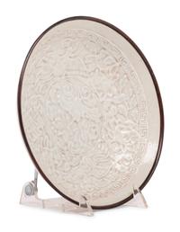 A Chinese Dingyao Style White Glazed Molded Porcelain Bowl