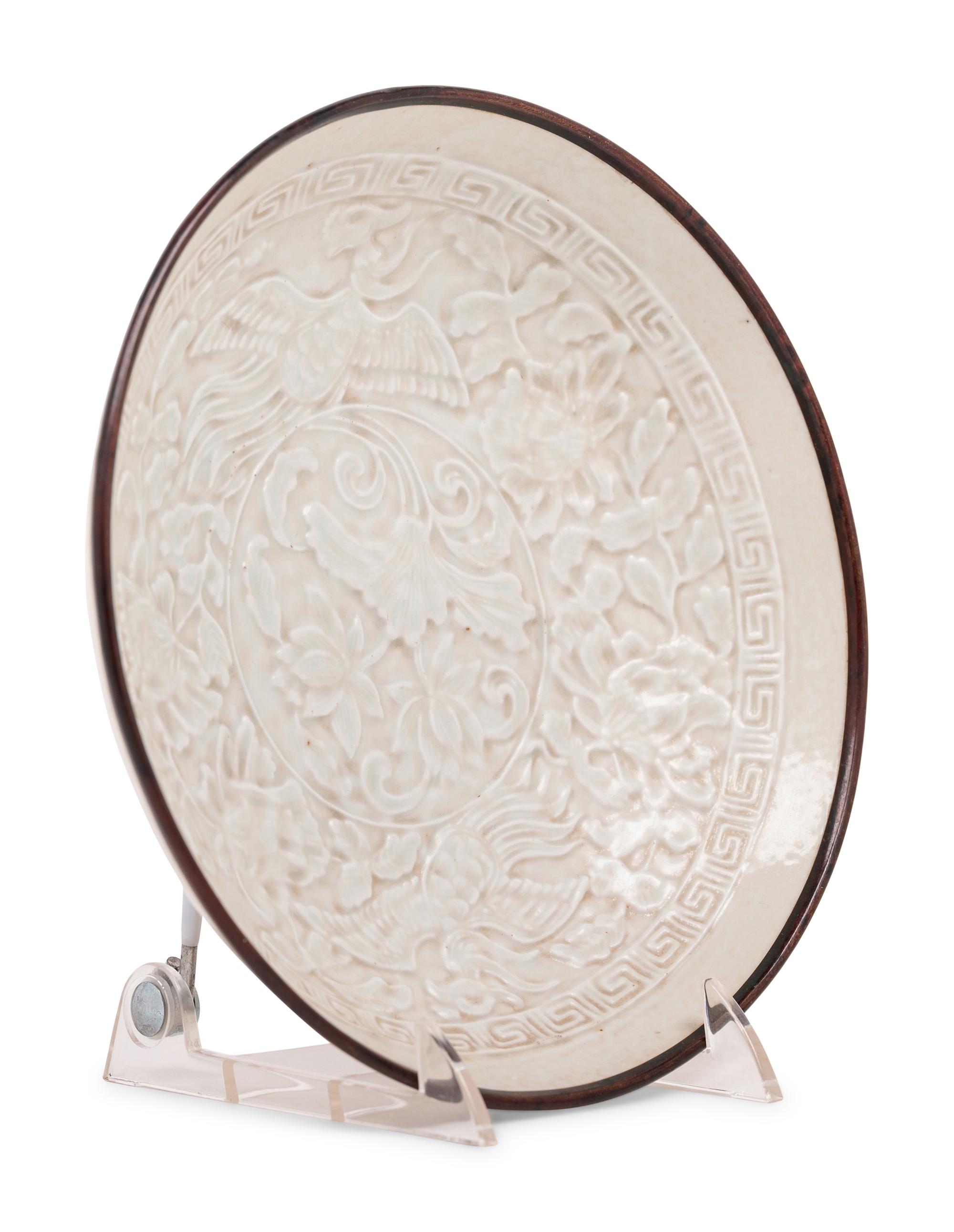 A Chinese Dingyao Style White Glazed Molded Porcelain Bowl