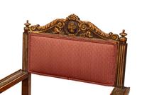 A Set of Four Flemish Baroque Revival Parcel Gilt Walnut Armchairs