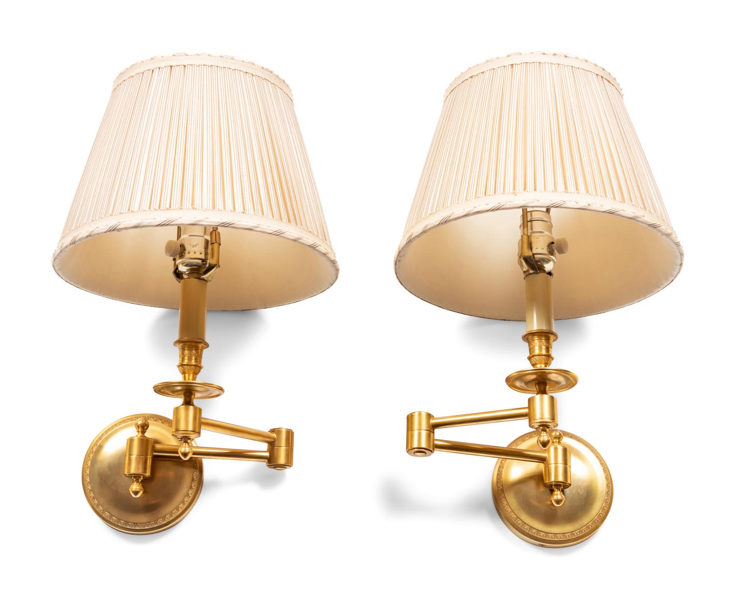 A Pair of Hinson Gilt Metal Swing-Arm Wall Lamps