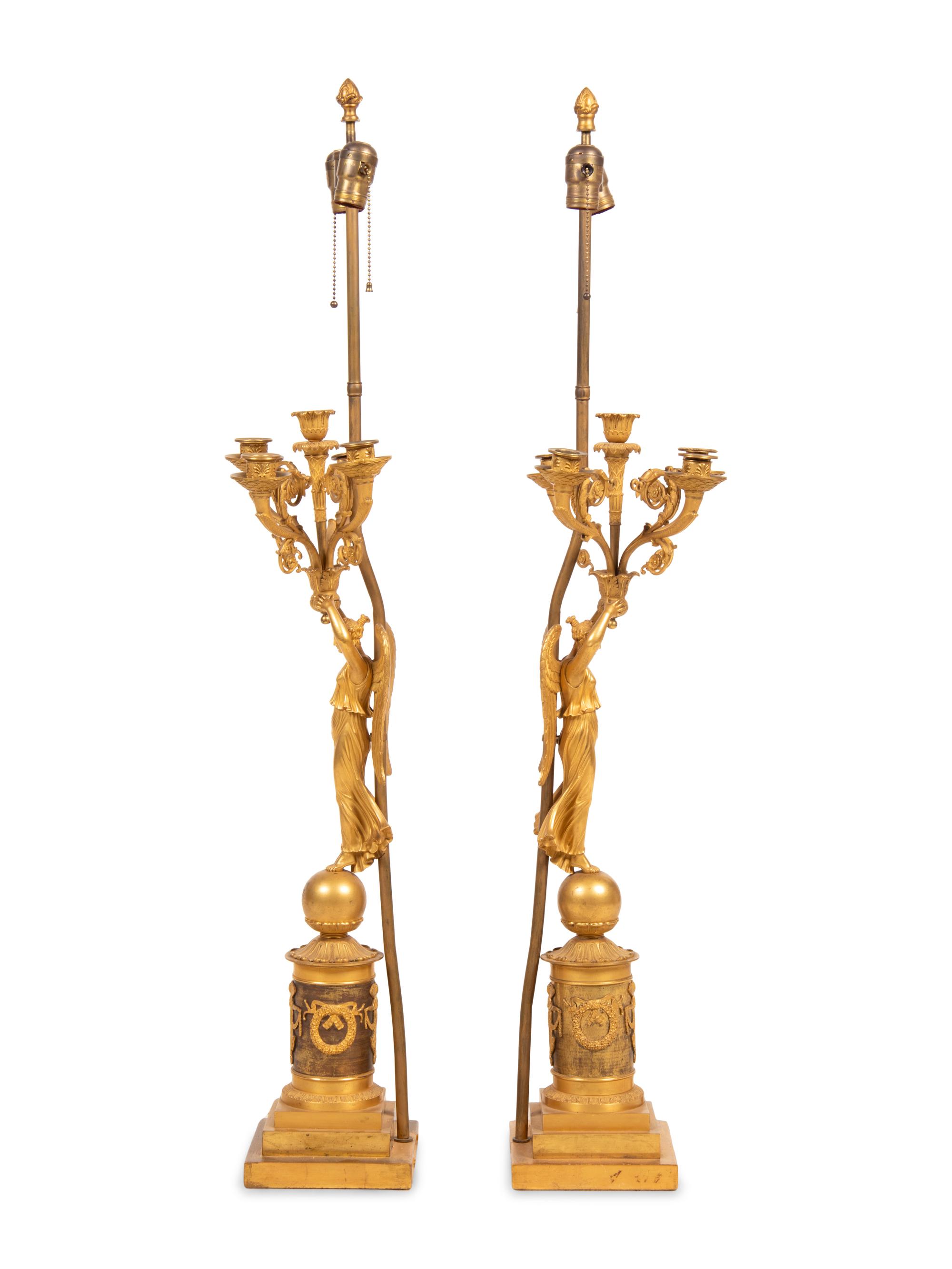 A Pair of Empire Style Gilt Bronze Figural Candelabra