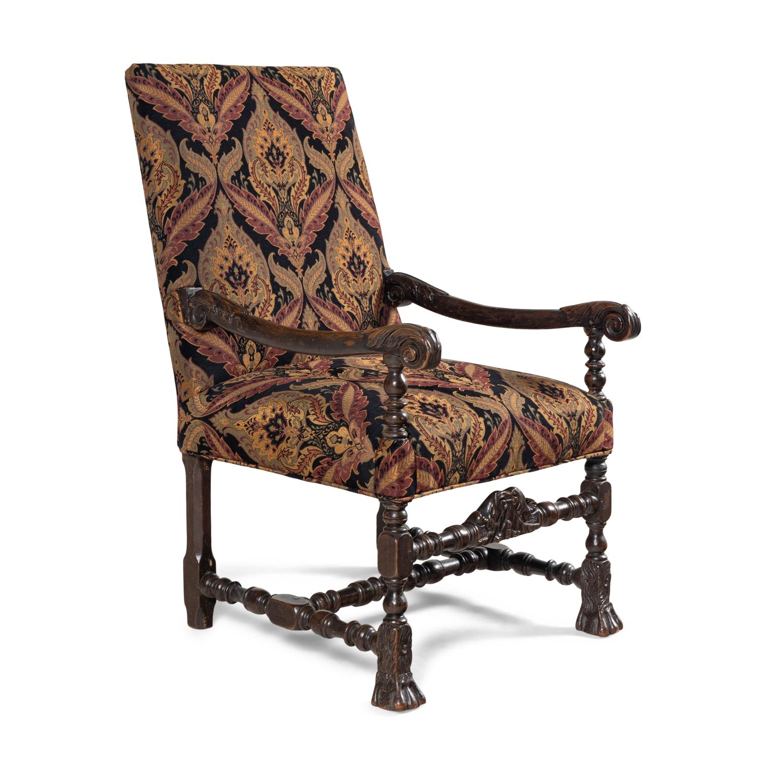 A Louis XIII Carved Walnut Fauteuil