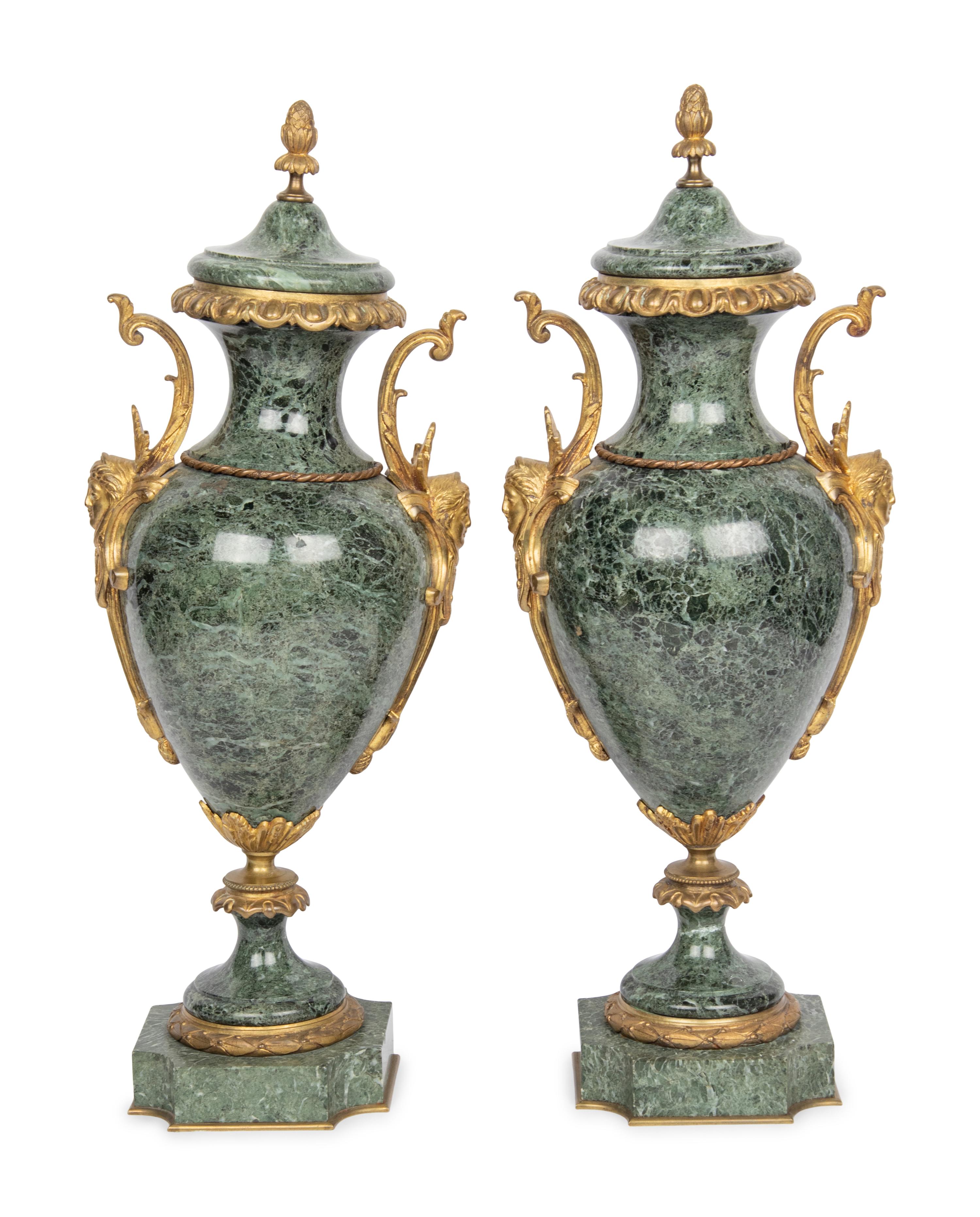 A Pair of French Gilt Bronze Mounted Marble Urns
