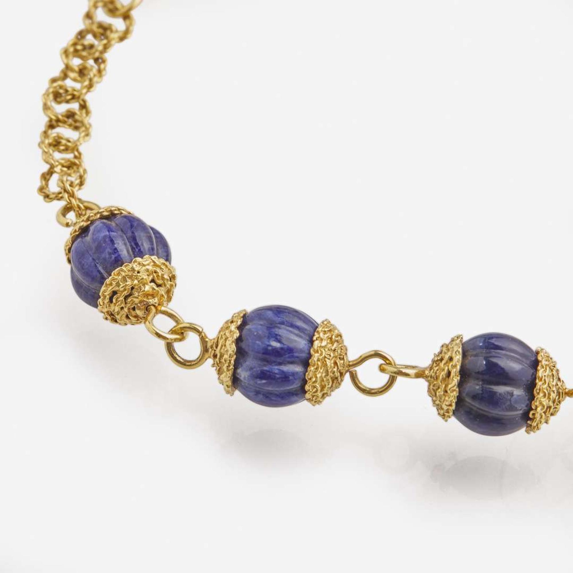 An 18K Yellow Gold Bead Necklace