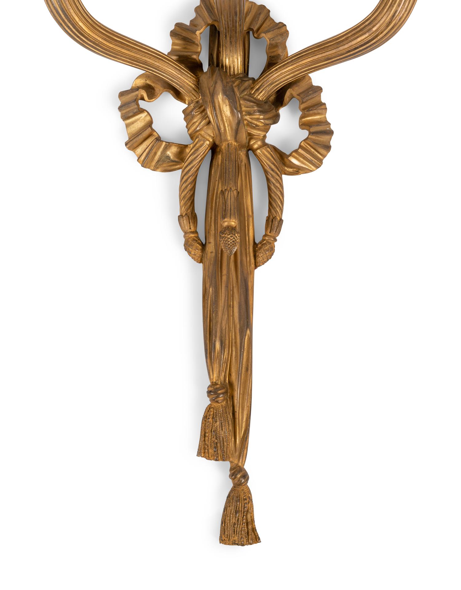 A Pair of Louis XVI Style Gilt Bronze Three-Light Sconces