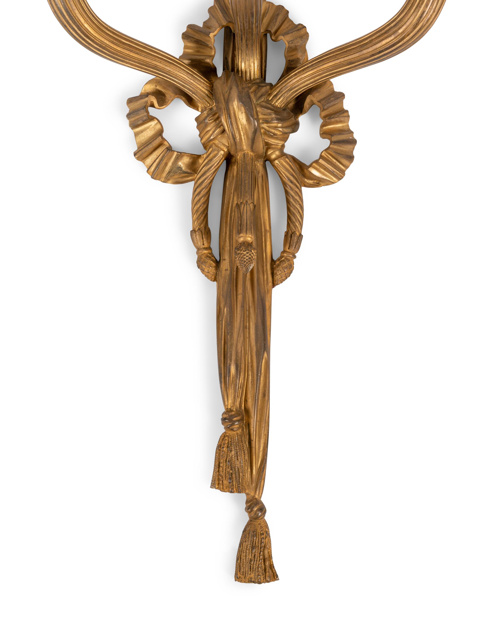 A Pair of Louis XVI Style Gilt Bronze Three-Light Sconces