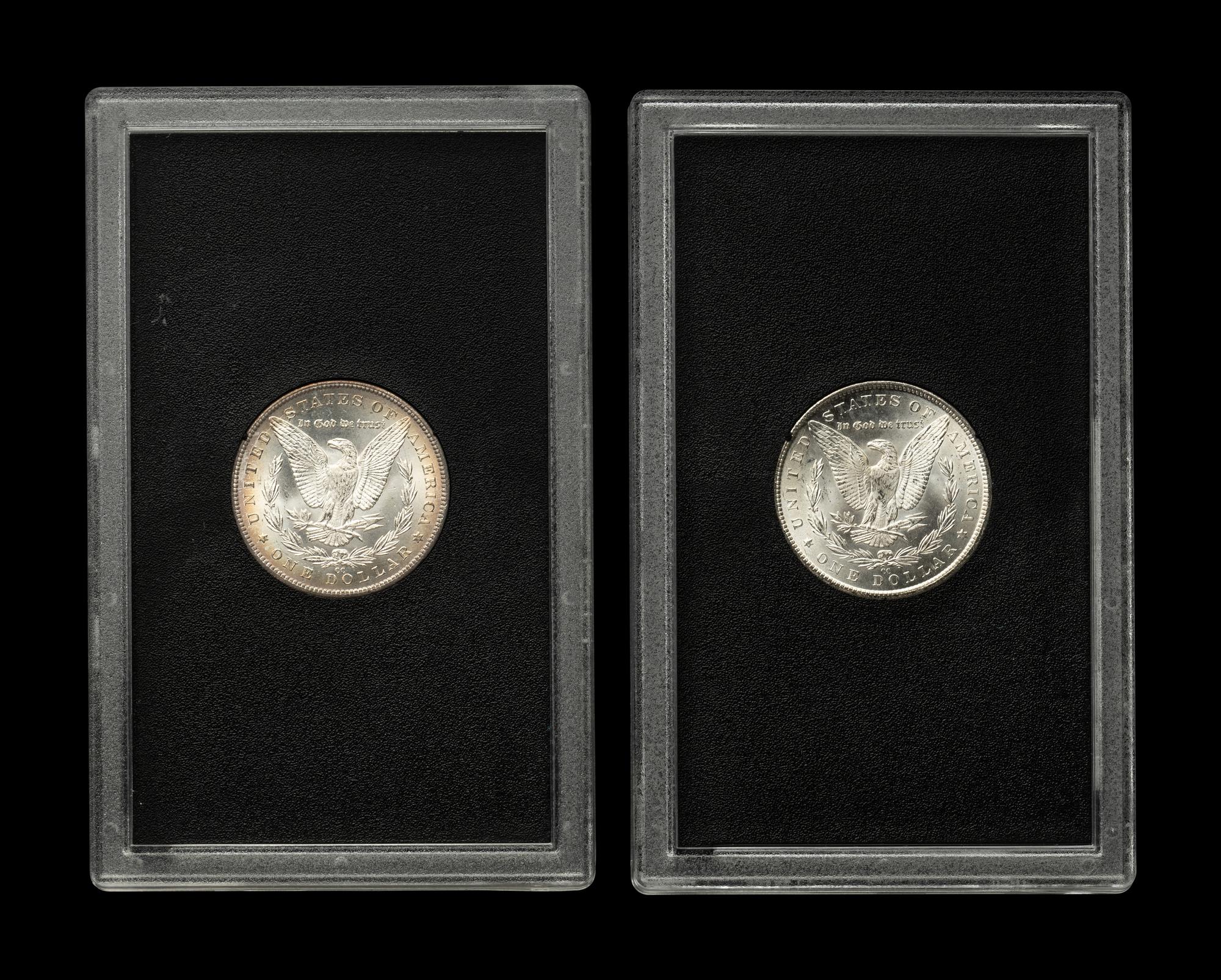 Two 1884-CC GSA: Morgan $1 Coins