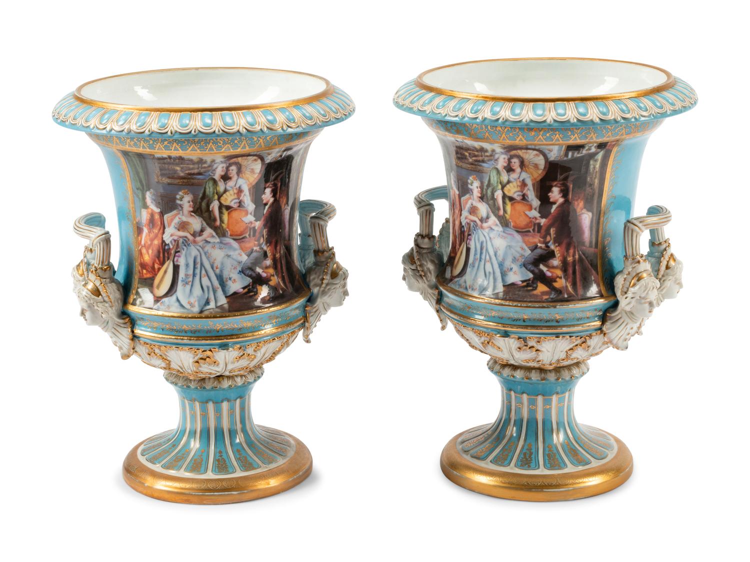 A Pair of Sèvres Style Porcelain Urns