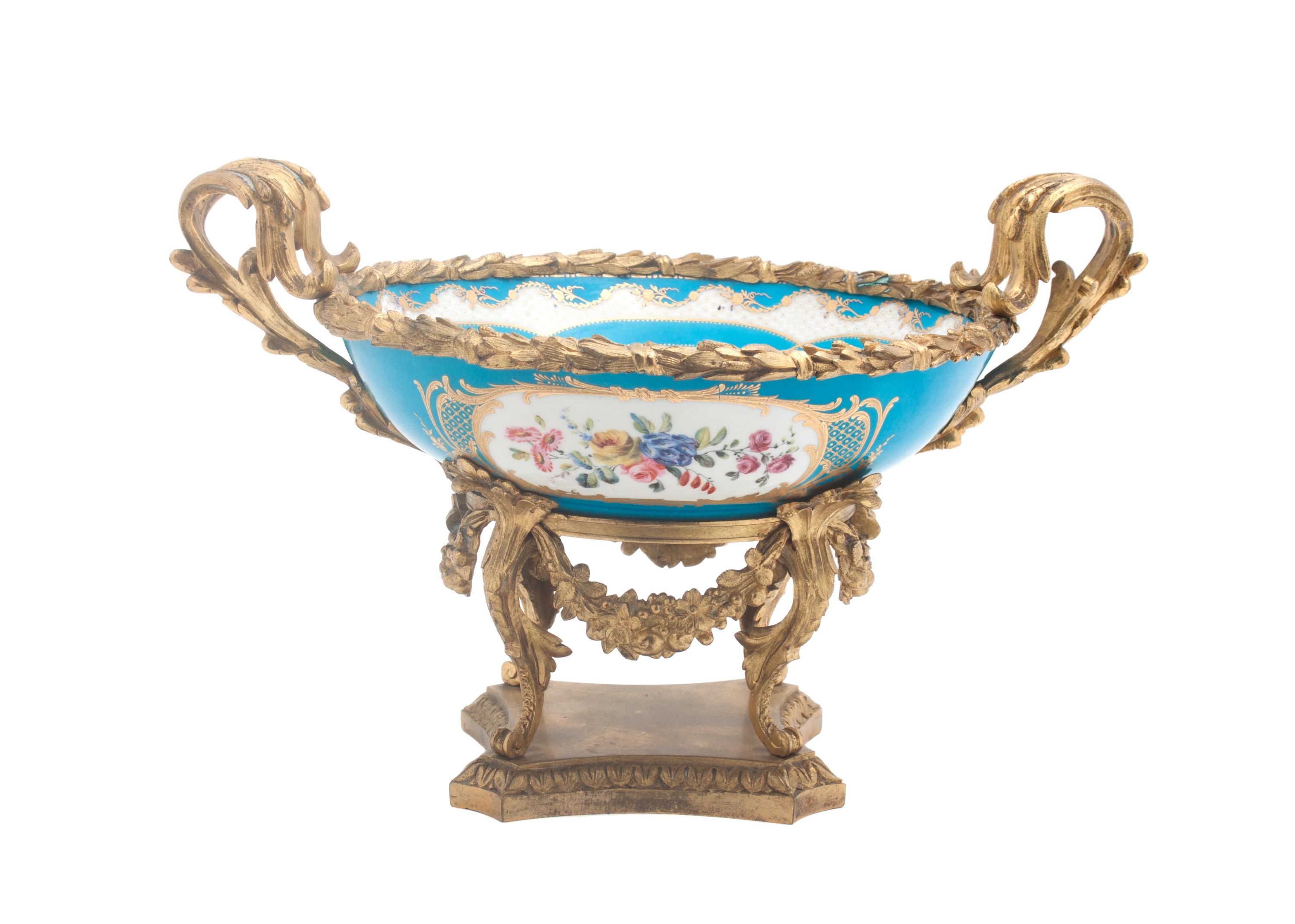 A Sevres Gilt Bronze Mounted Center Bowl Width over handles 14 1/4 inches. — 19TH CENTURY