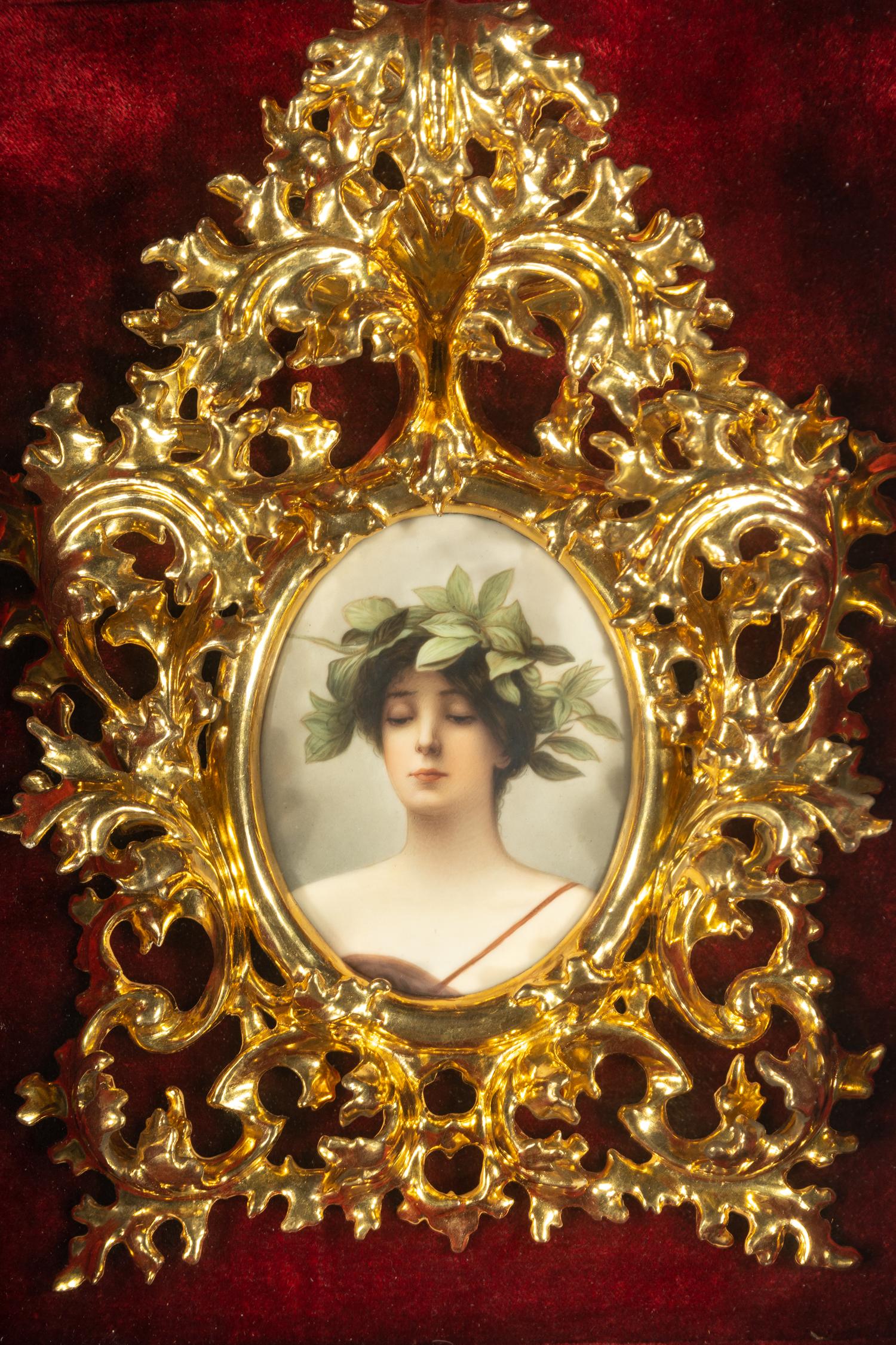 A Continental Porcelain Plaque in a Giltwood Frame