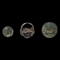 A Roman Silver Head and Two Roman Bronze Coins