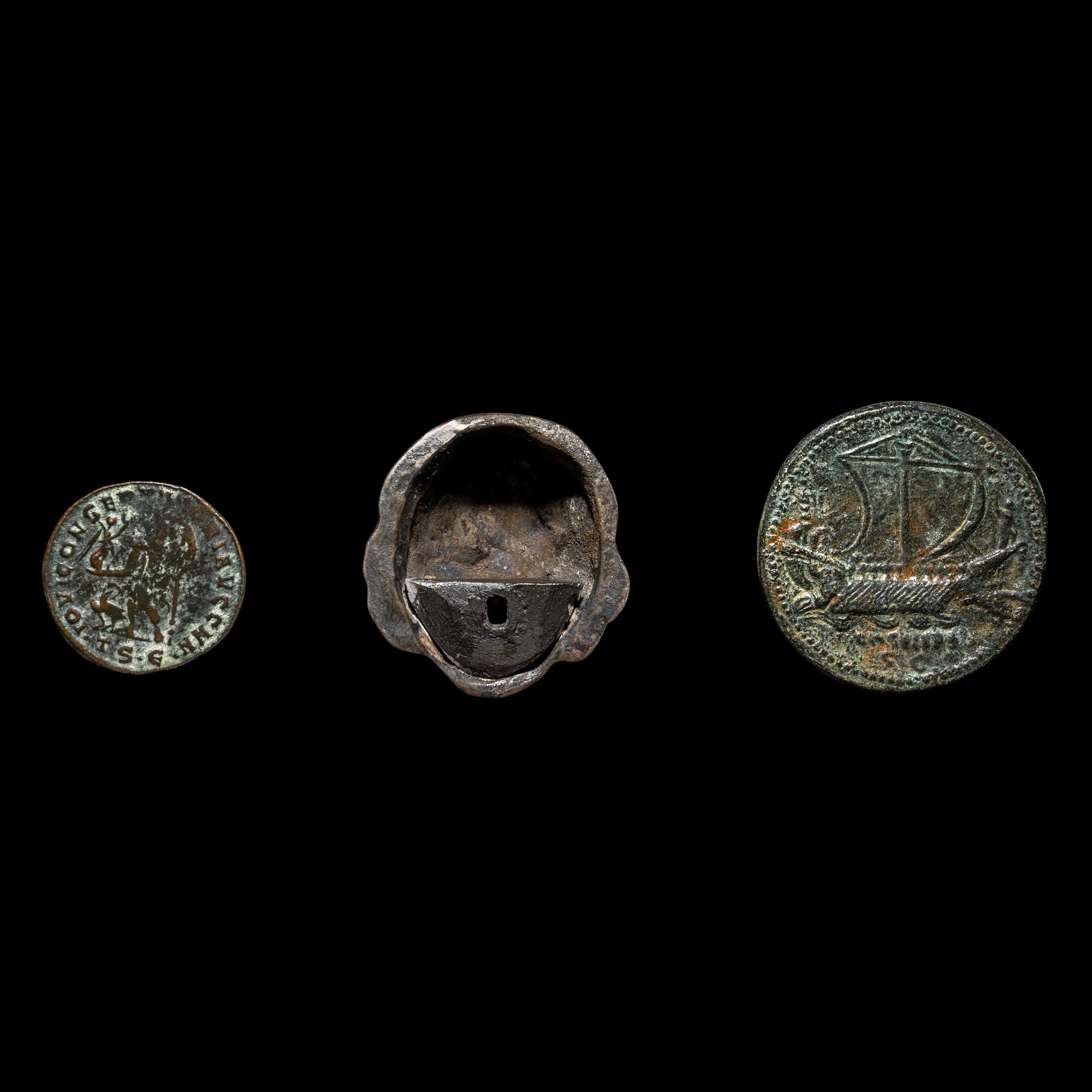A Roman Silver Head and Two Roman Bronze Coins