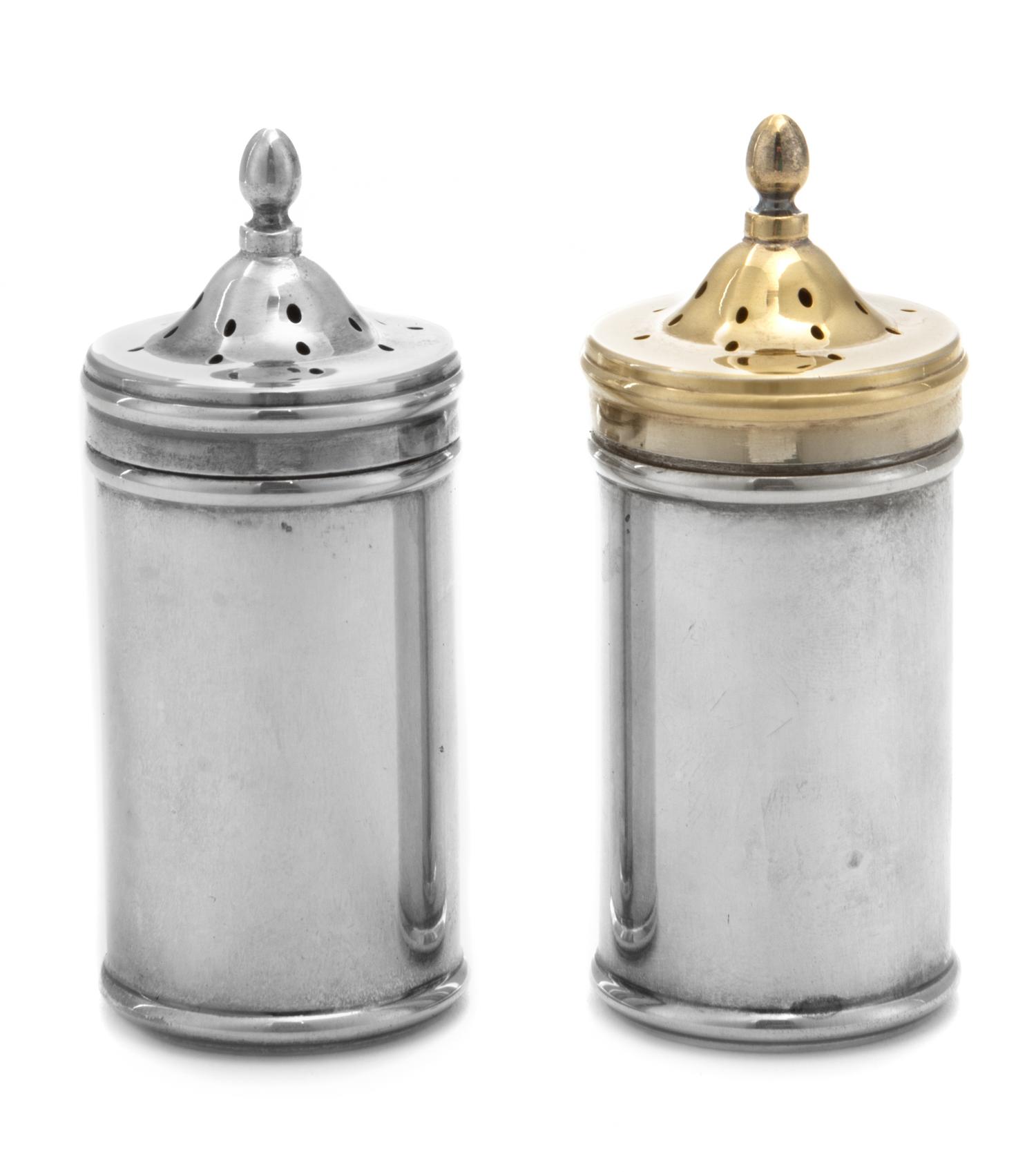 A Pair of American Silver Casters, Tiffany & Co., New York, NY, each of canister form with removable glass inserts, the lids surmounted