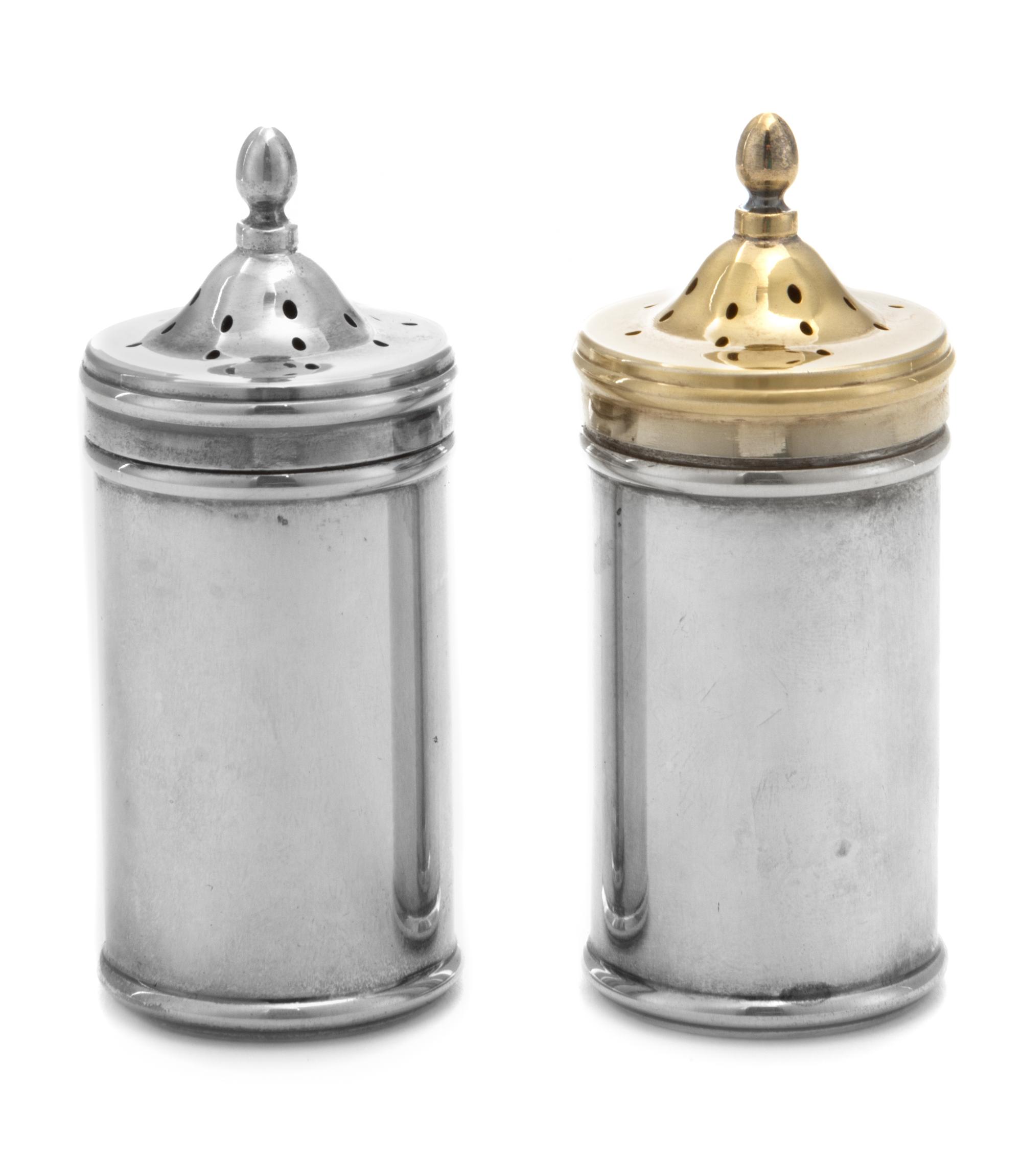 A Pair of American Silver Casters, Tiffany & Co., New York, NY, each of canister form with removable glass inserts, the lids surmounted