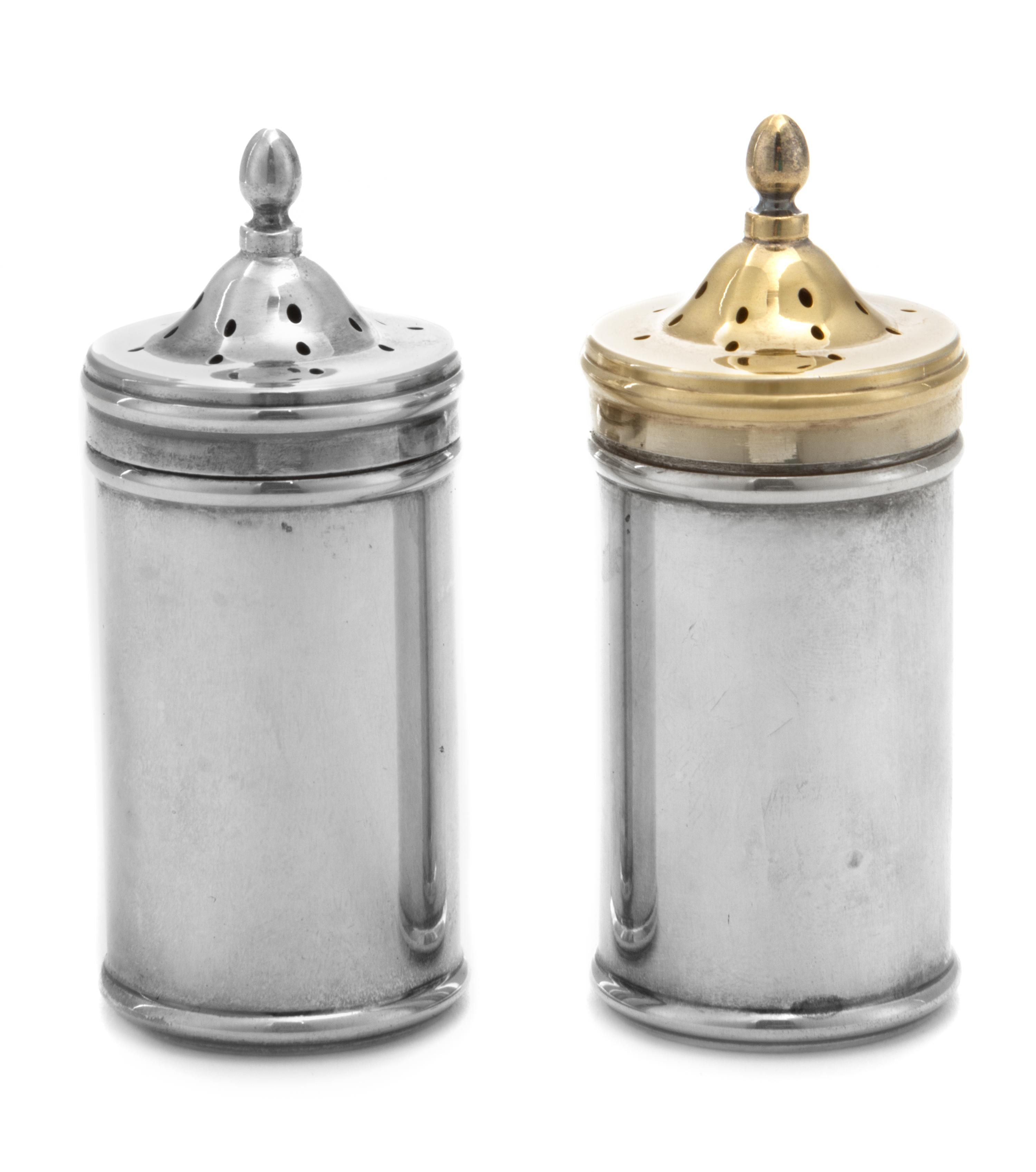 A Pair of American Silver Casters, Tiffany & Co., New York, NY, each of canister form with removable glass inserts, the lids surmounted