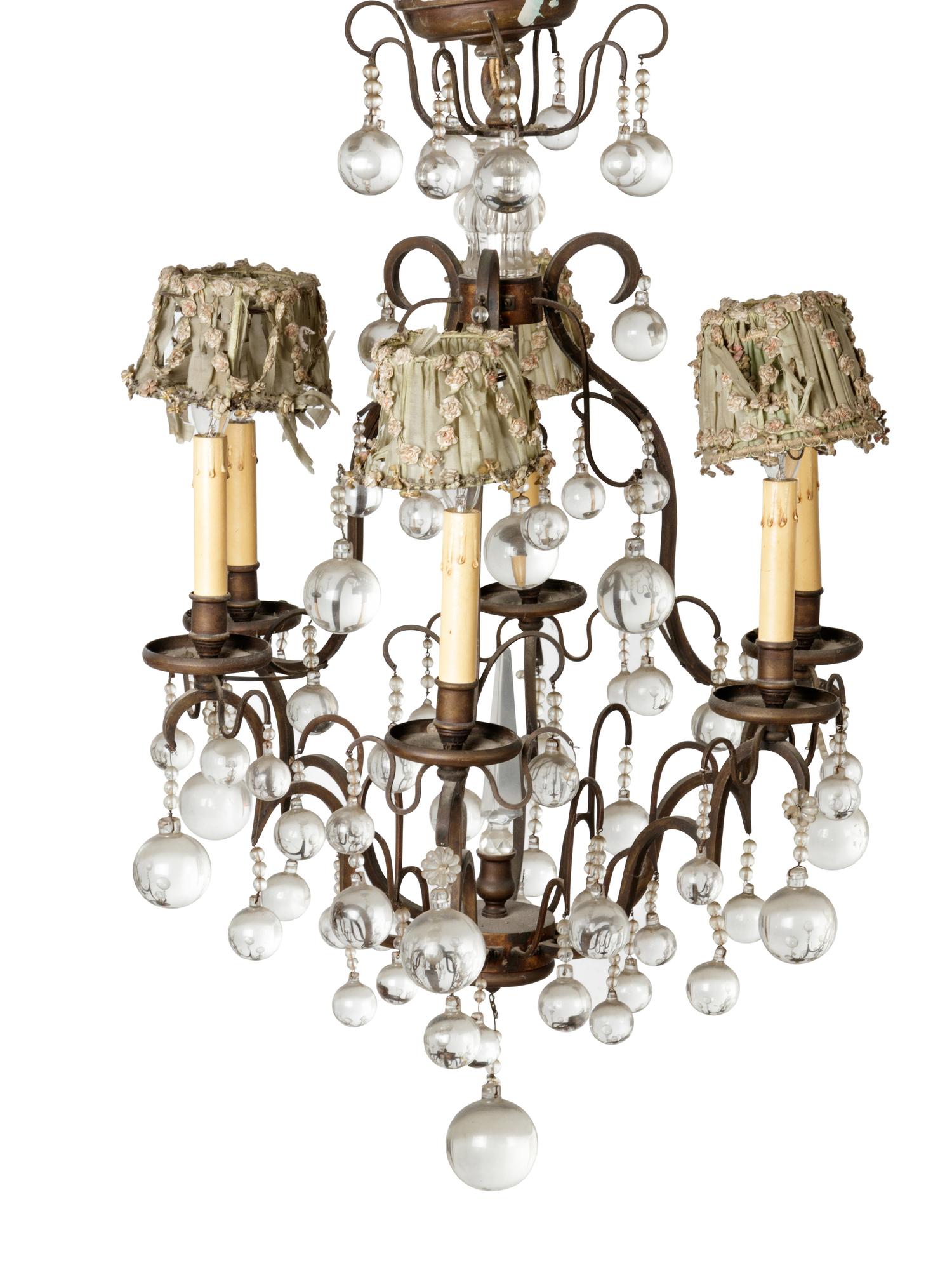 An Iron and Glass Six-Light Chandelier