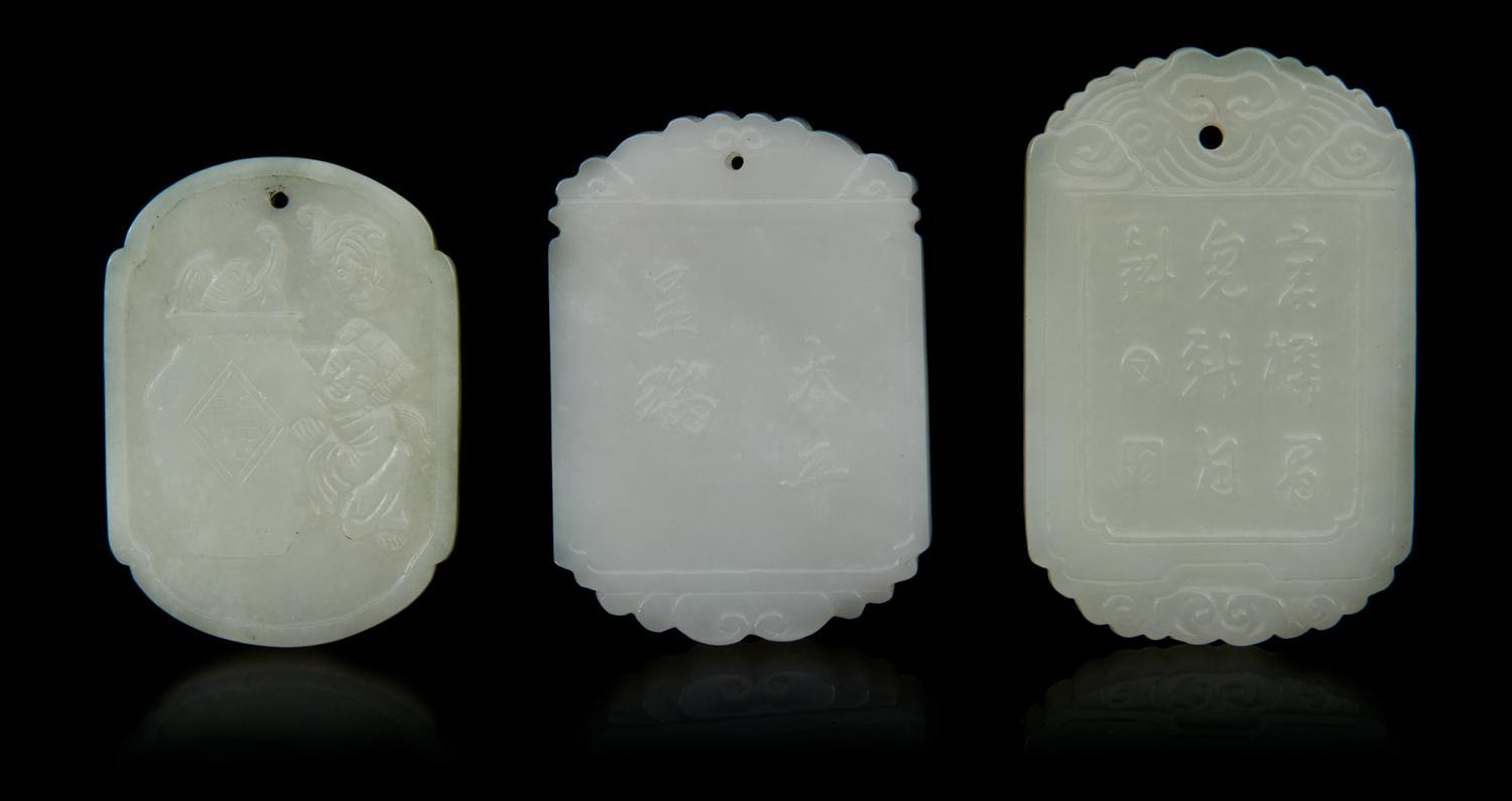 Three Carved Jade Pendants Length of first 2 1/8 inches.