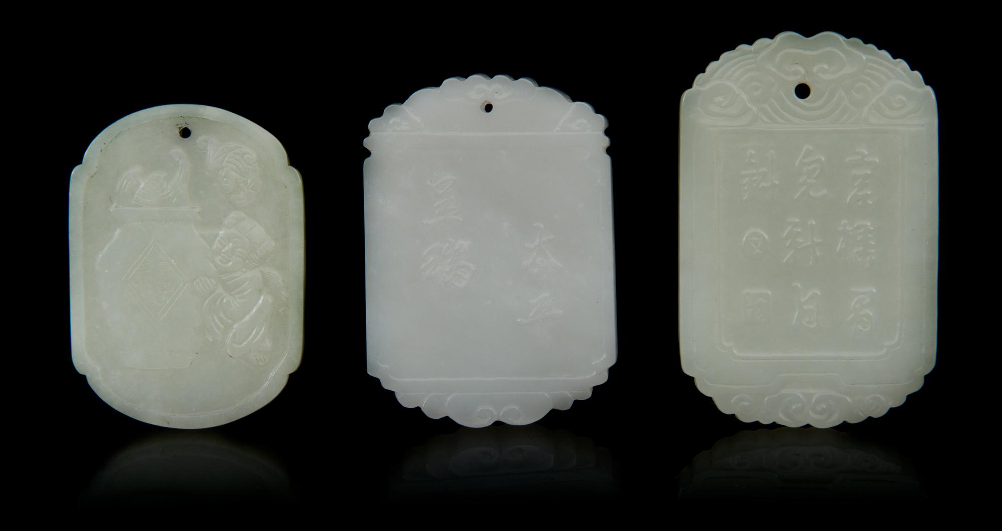 Three Carved Jade Pendants Length of first 2 1/8 inches.