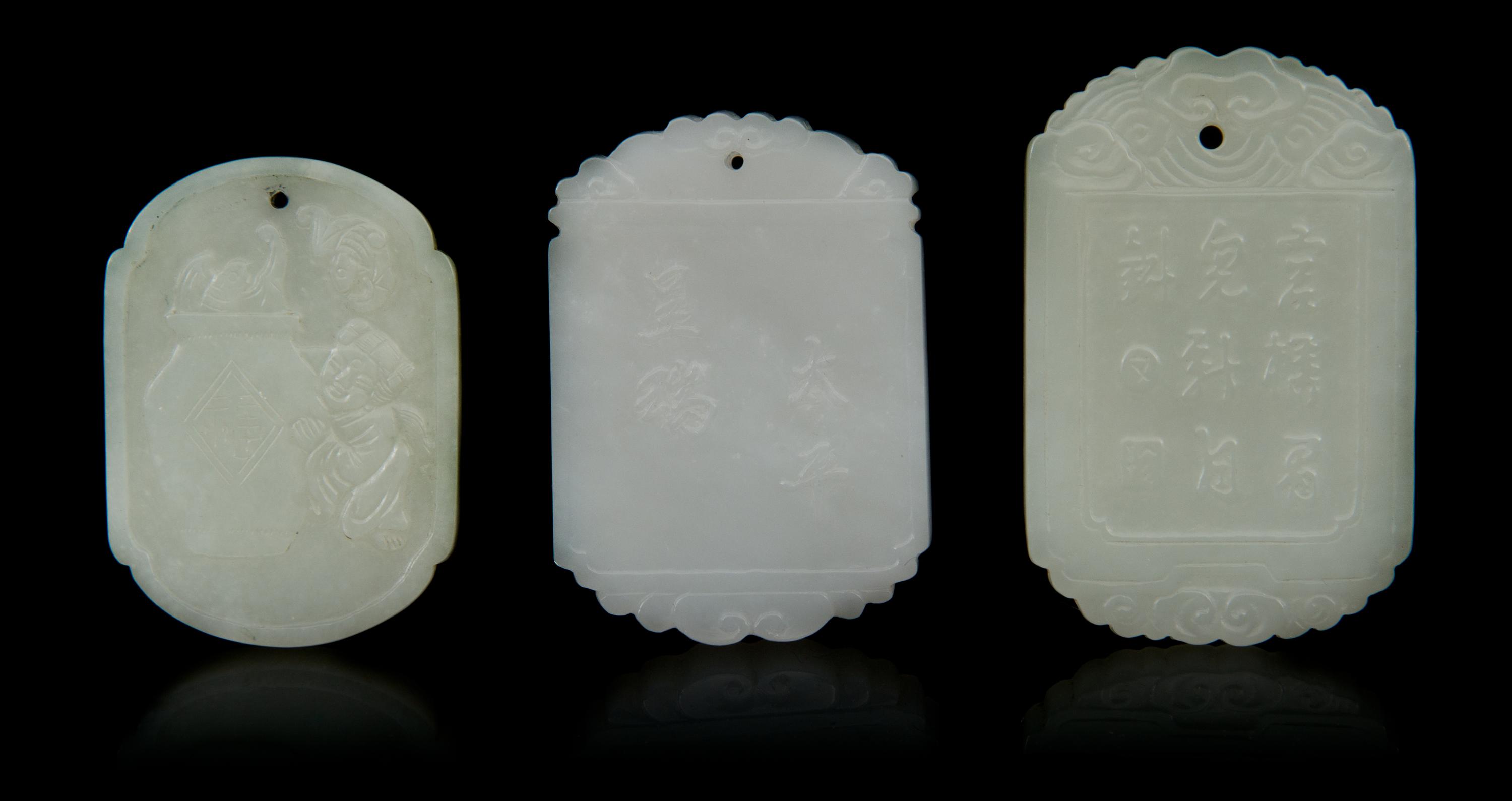 Three Carved Jade Pendants Length of first 2 1/8 inches.