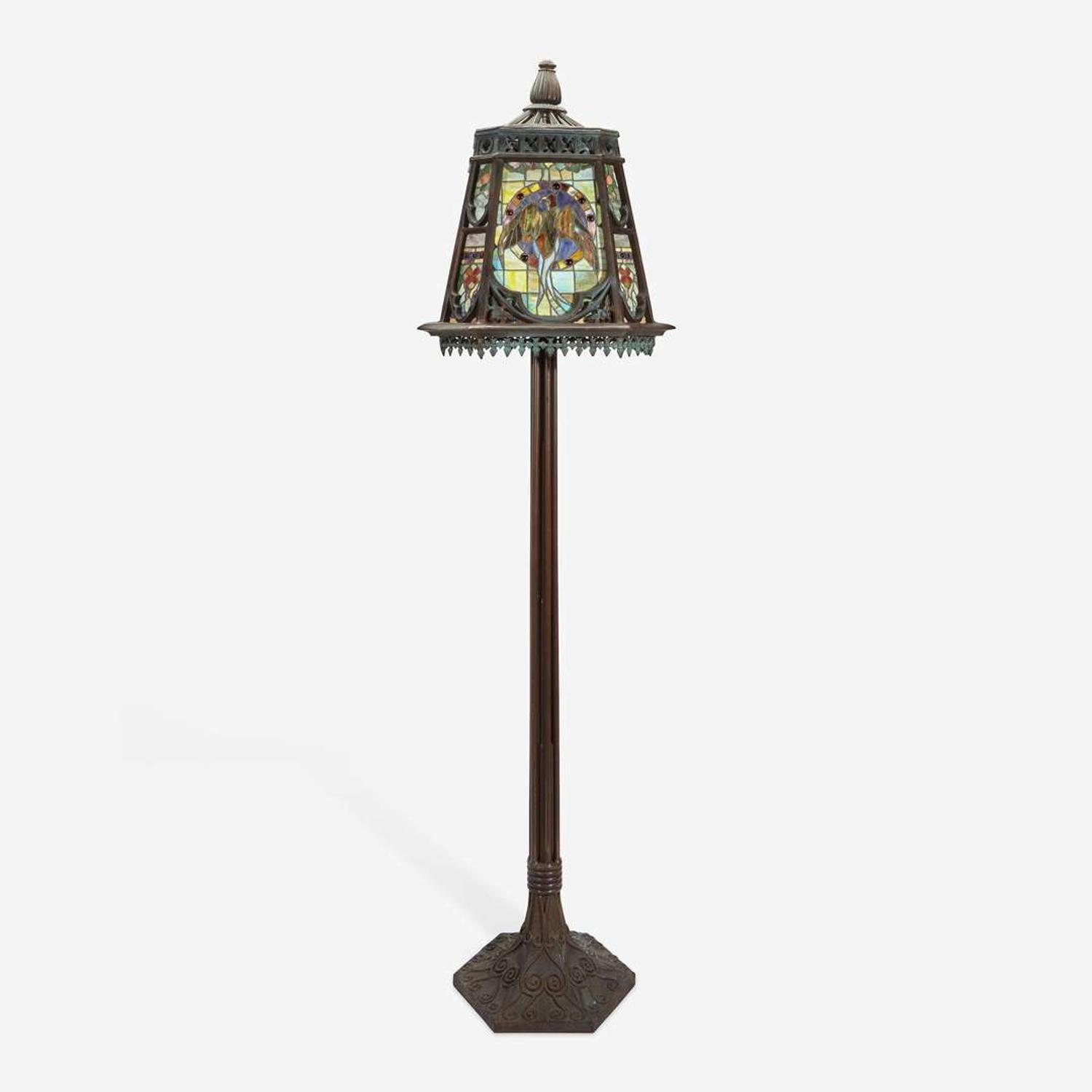 An Arts & Crafts Style Patinated Bronze and Stained Glass Standard Lamp 20th century