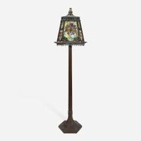 An Arts & Crafts Style Patinated Bronze and Stained Glass Standard Lamp 20th century