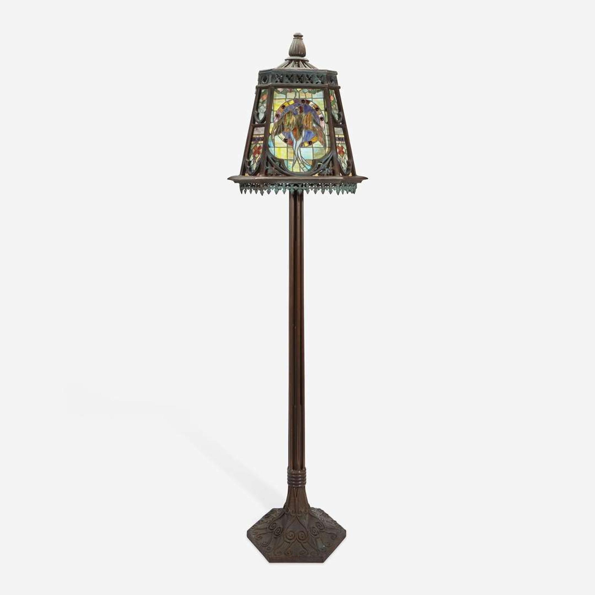 An Arts & Crafts Style Patinated Bronze and Stained Glass Standard Lamp 20th century