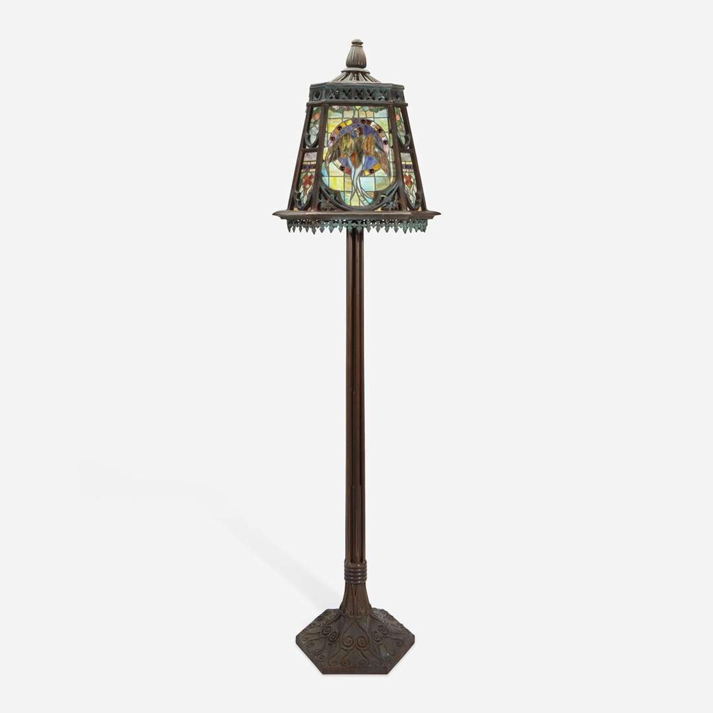 An Arts & Crafts Style Patinated Bronze and Stained Glass Standard Lamp 20th century