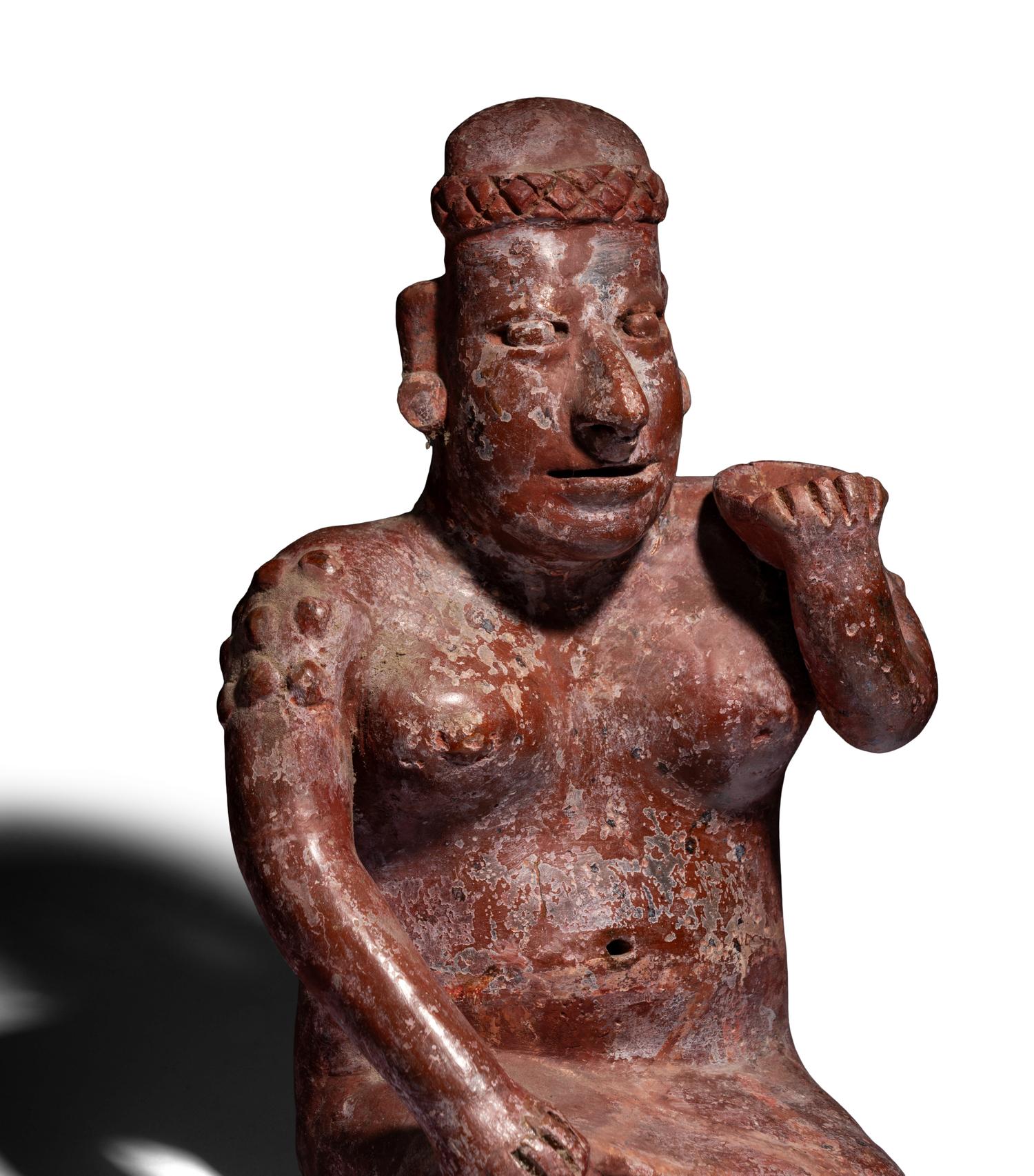 A Colima Seated Figure