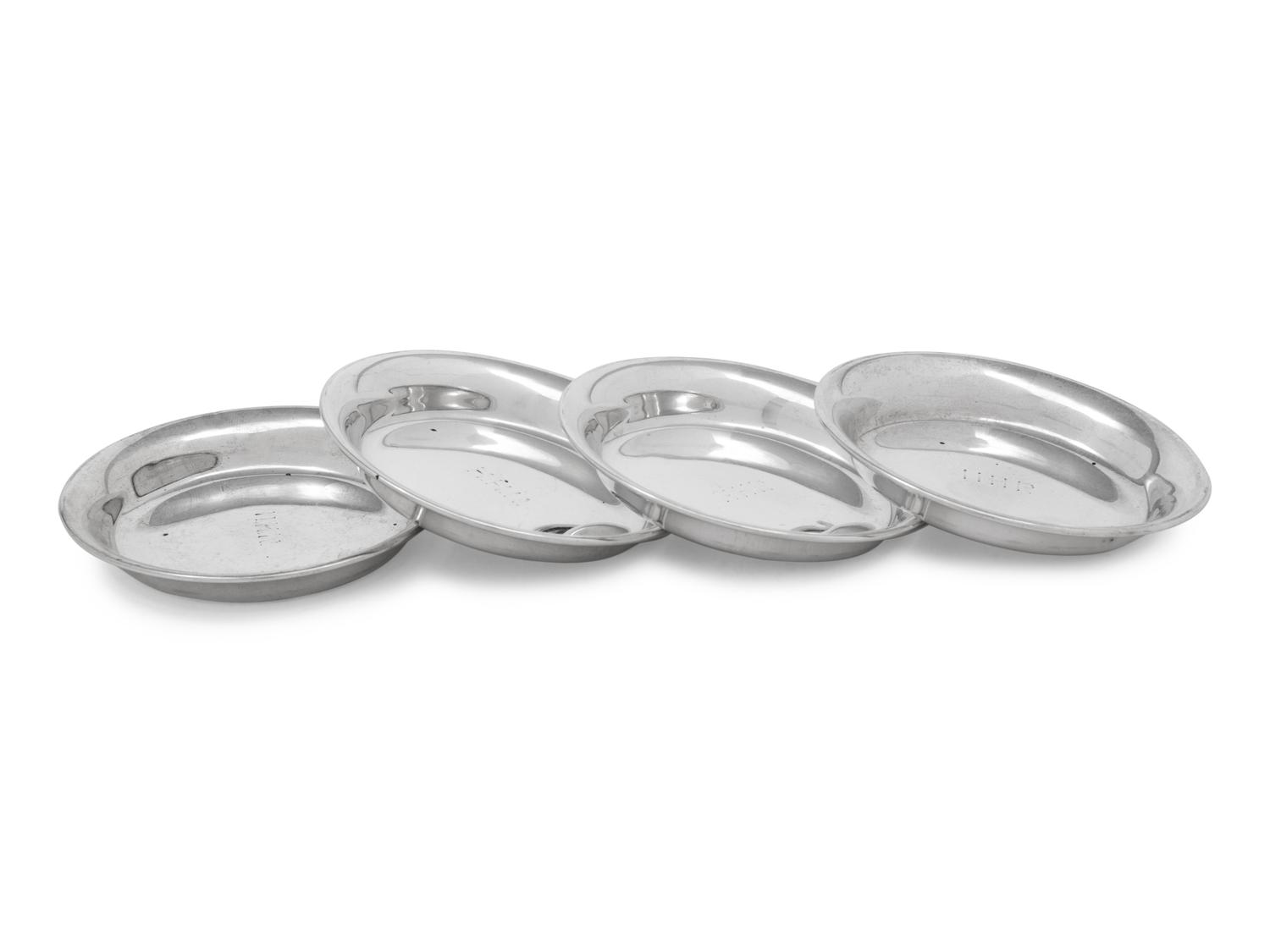A Set of Four S. Kirk and Son Silver Butter Pats