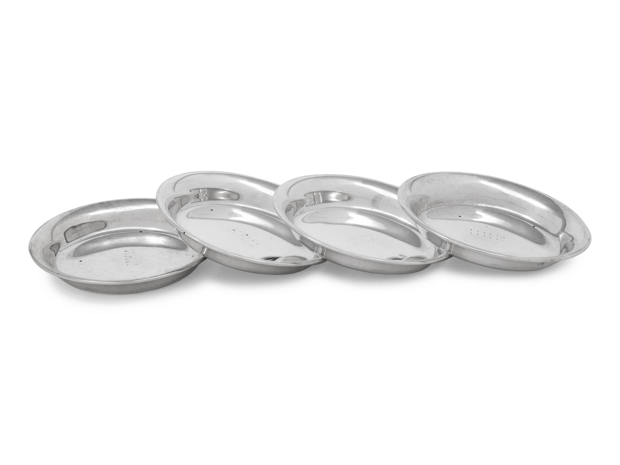 A Set of Four S. Kirk and Son Silver Butter Pats