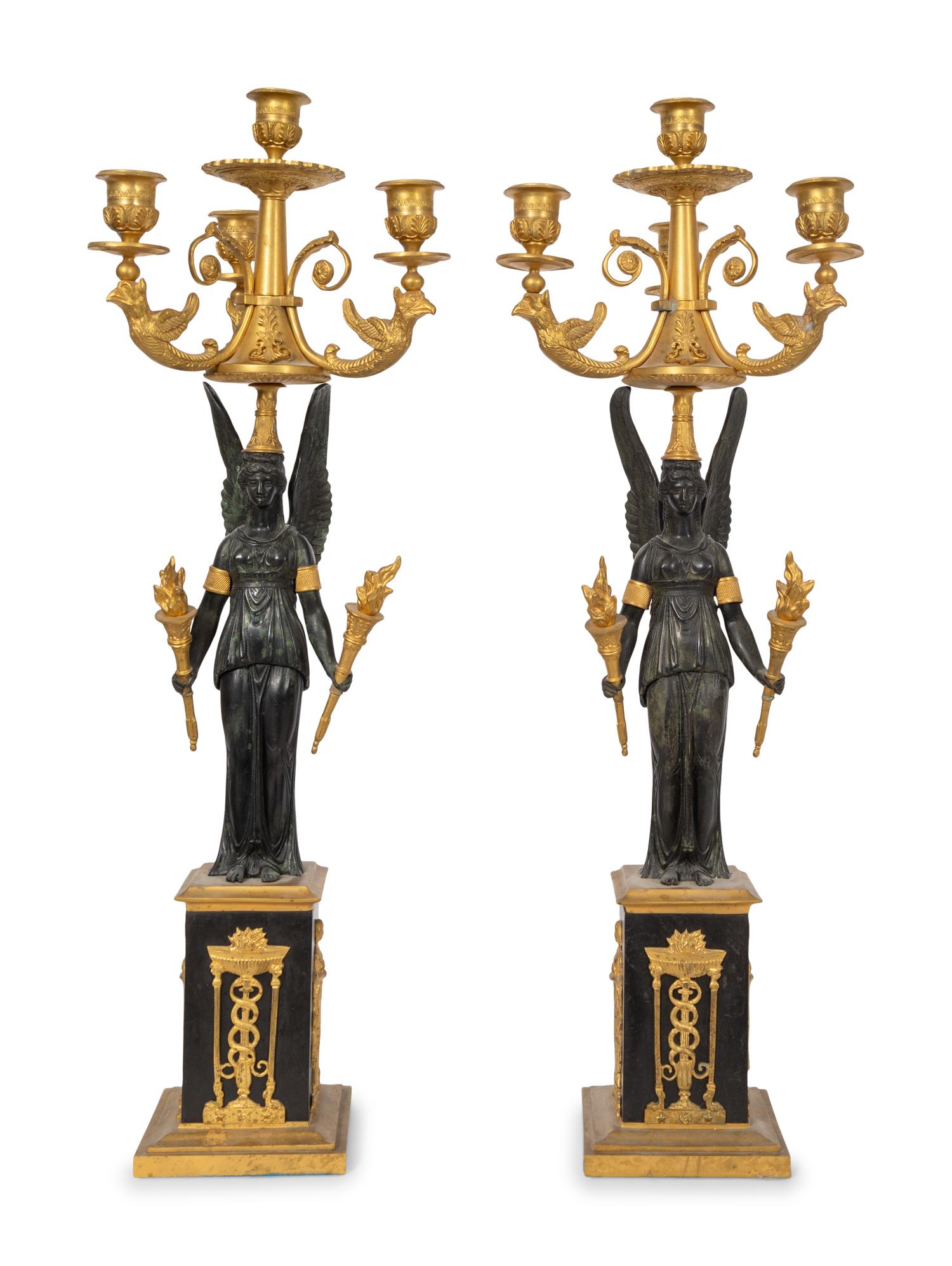 A Pair of Empire Style Gilt and Patinated Bronze Three-Light Candelabra