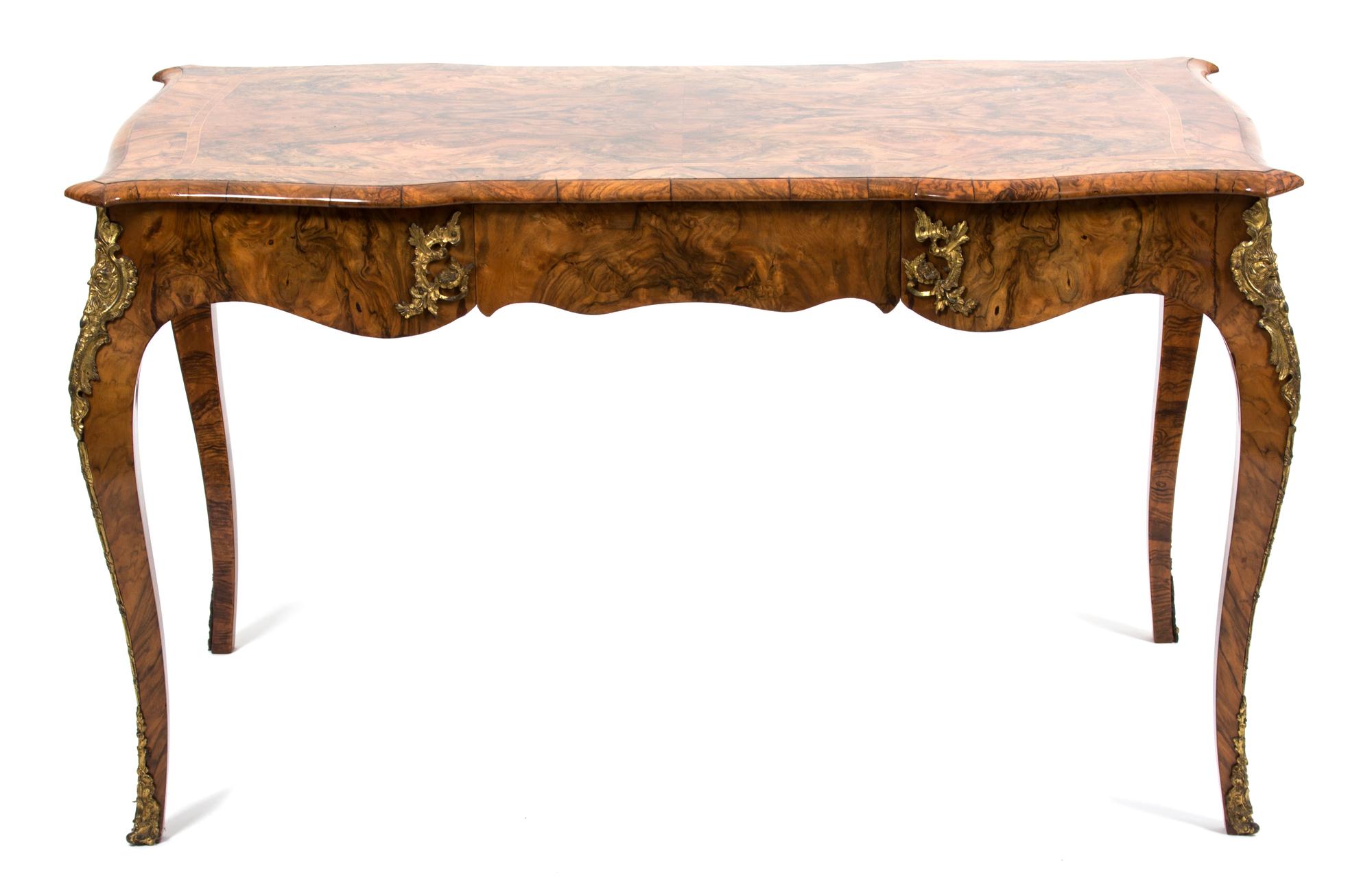 An Italian Louis XV Style Walnut Bureau Plat Height 27 1/2 x width 48 x depth 28 3/4 inches. — 19TH CENTURY