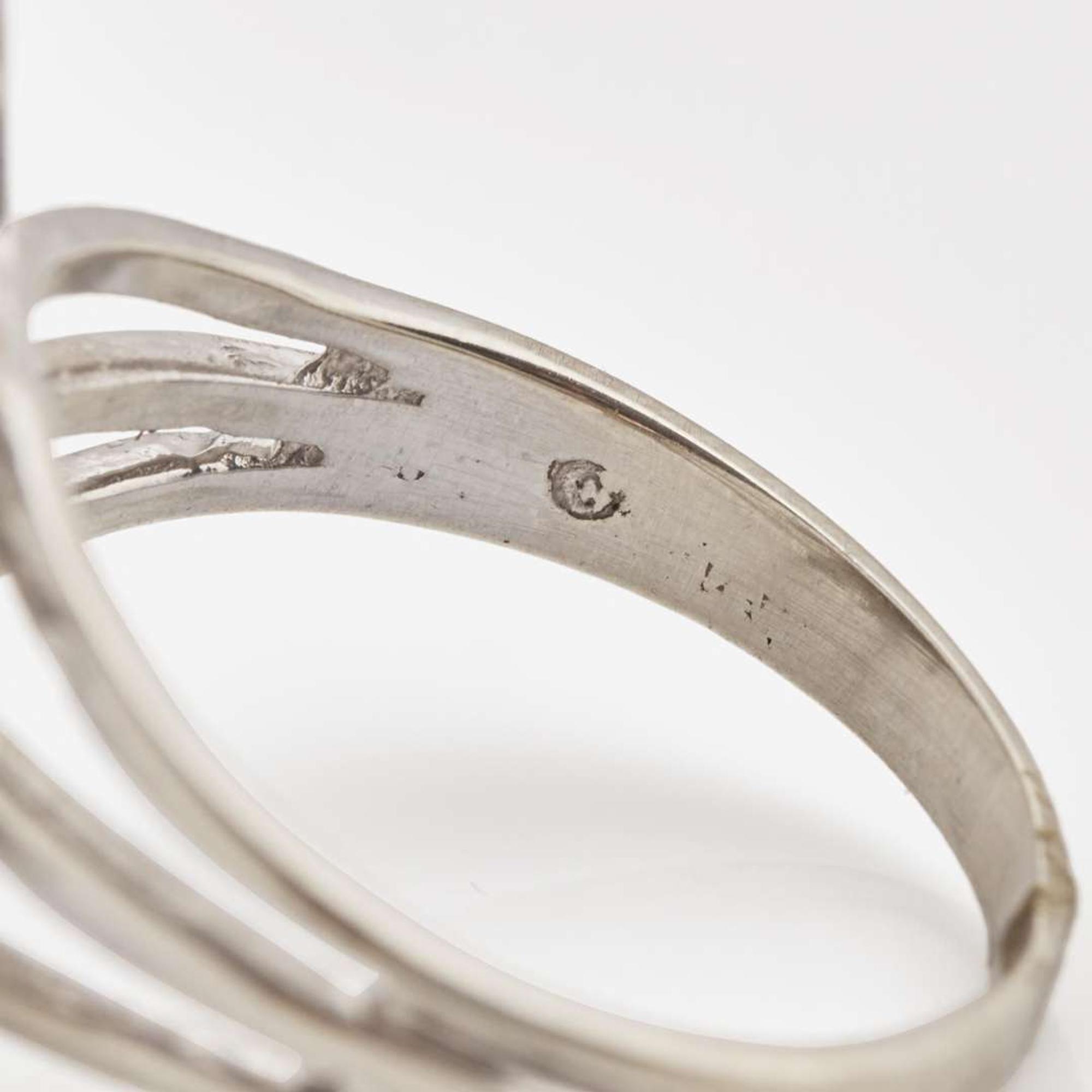 A Set of 14K White Gold and Diamond Earrings and Ring