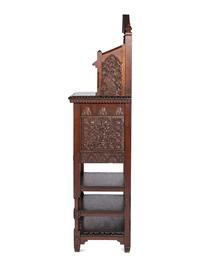 with carved floral and butterfly motifs