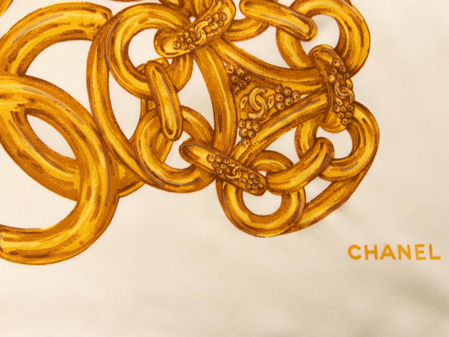 Five Chanel Items: Four Scarves and One Brooch, 1980-2000s
