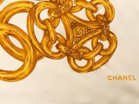 Five Chanel Items: Four Scarves and One Brooch, 1980-2000s