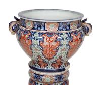 A Japanese Porcelain Jardinière and Pedestal