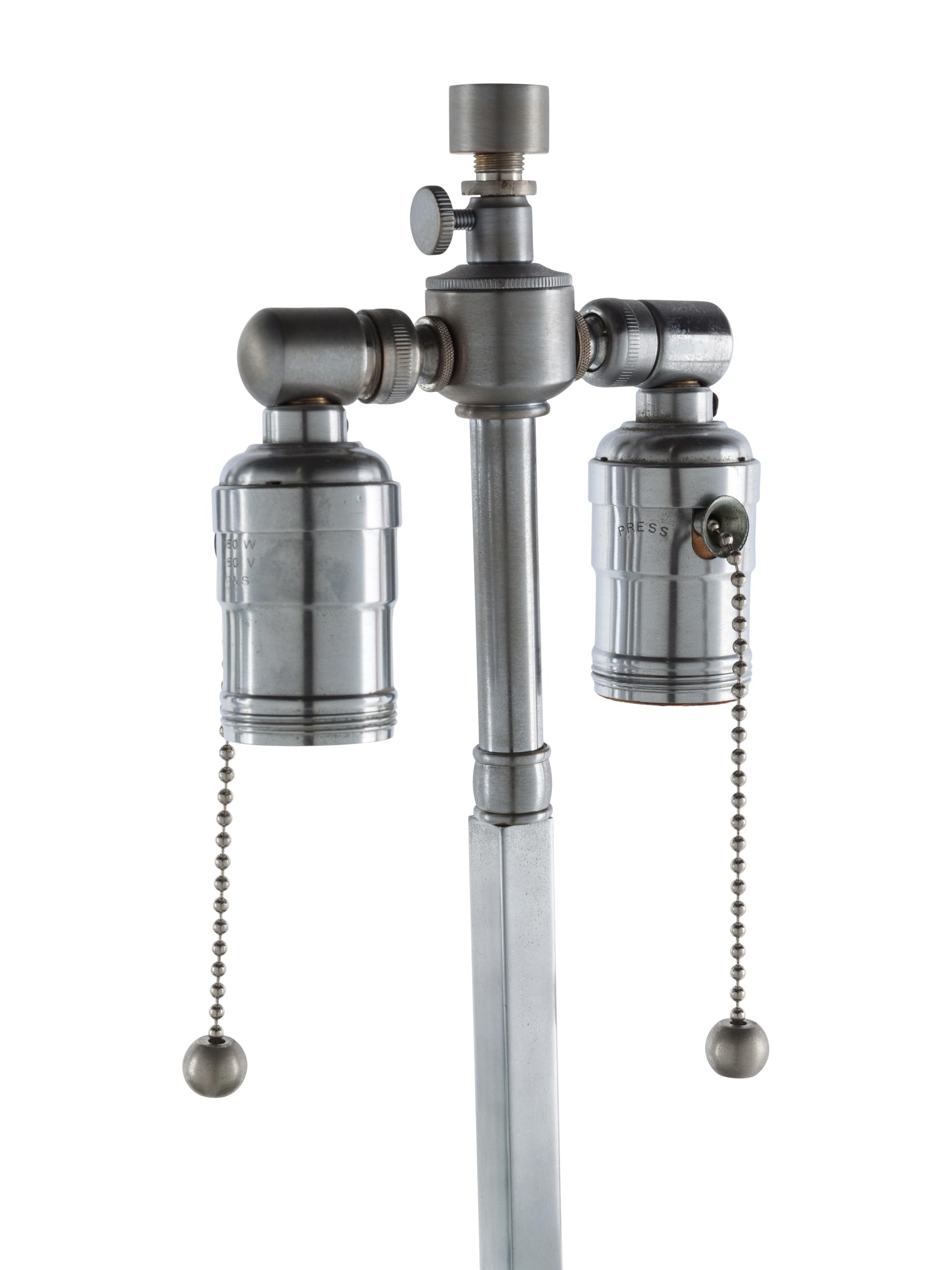 A Pair of Glass and Chromed Steel Table Lamps in the Style of Jean Michel Frank