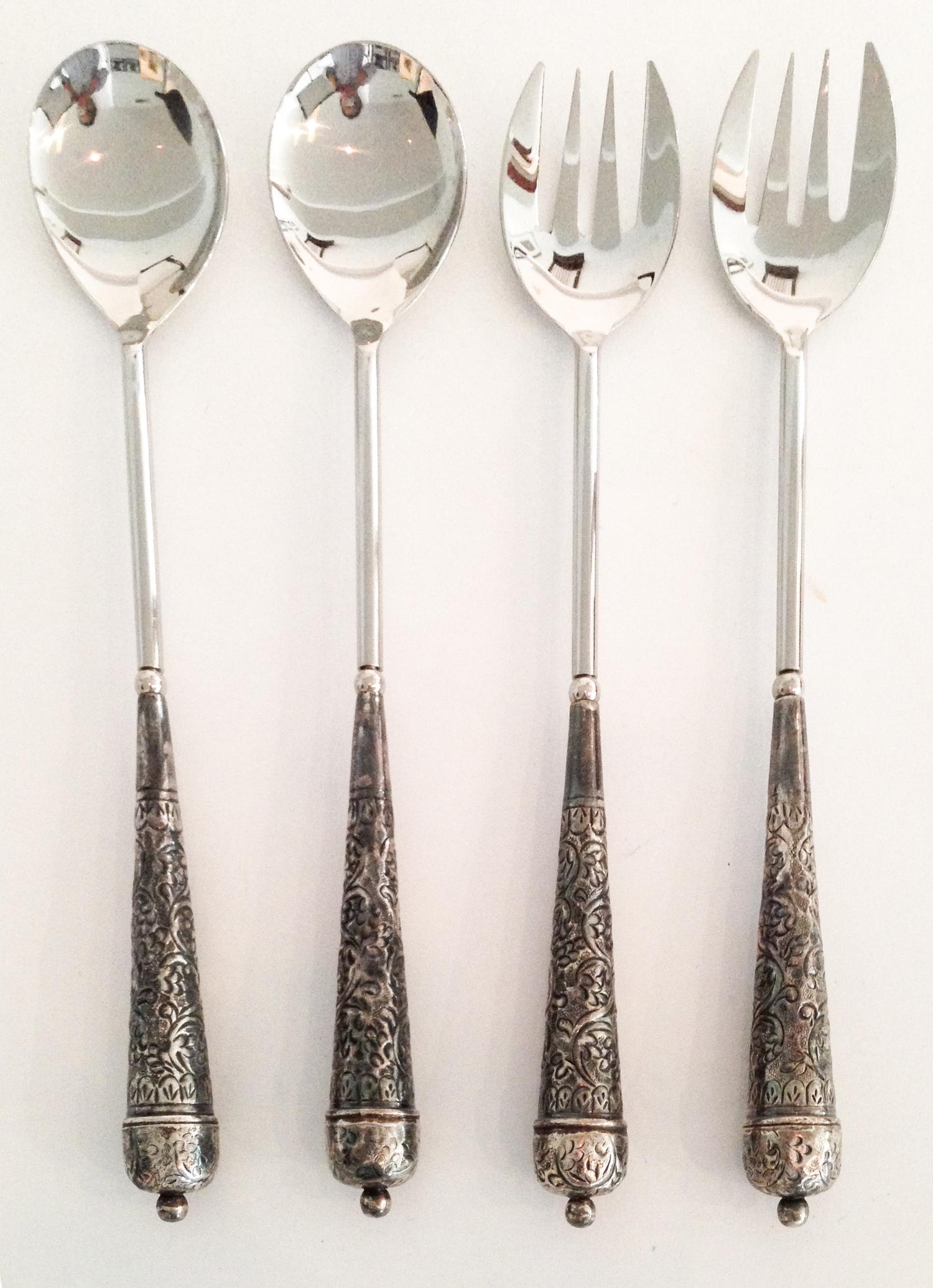 Two Pairs of Silvered Metal Handled Salad Servers Length 16 1/4 inches.