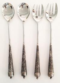 Two Pairs of Silvered Metal Handled Salad Servers Length 16 1/4 inches.
