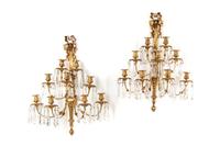 A Pair of Louis XVI Style Gilt Bronze and Cut Glass Nine-Light Sconces