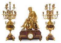 A Large French Gilt Bronze and Marble Clock Garniture Height of candelabra 30 1/2 inches. — 19TH CENTURY