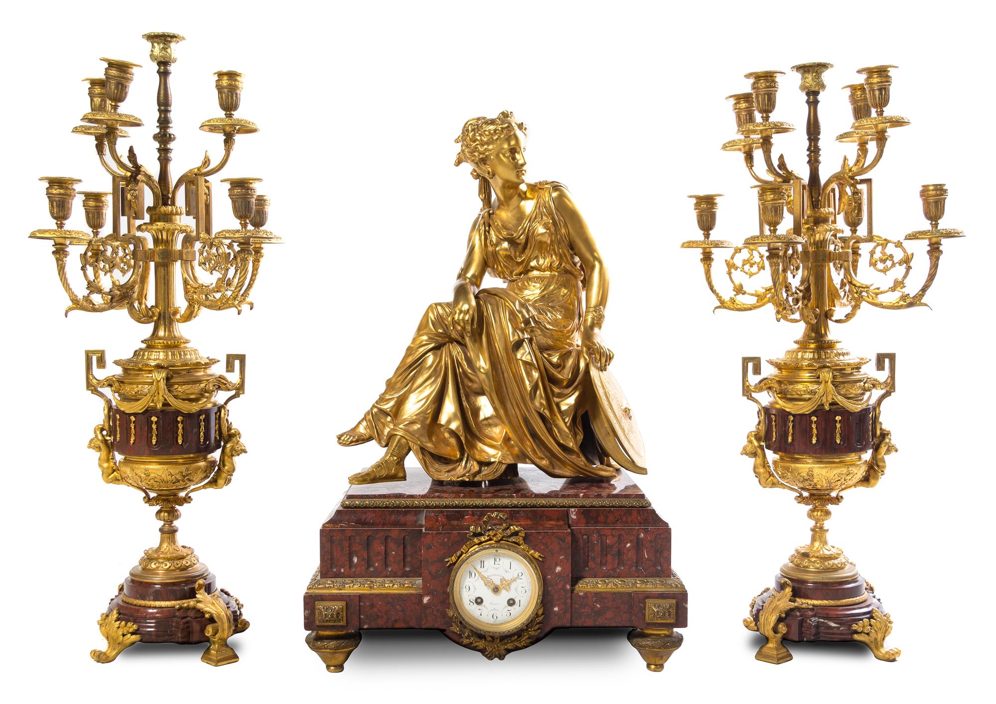 A Large French Gilt Bronze and Marble Clock Garniture Height of candelabra 30 1/2 inches. — 19TH CENTURY