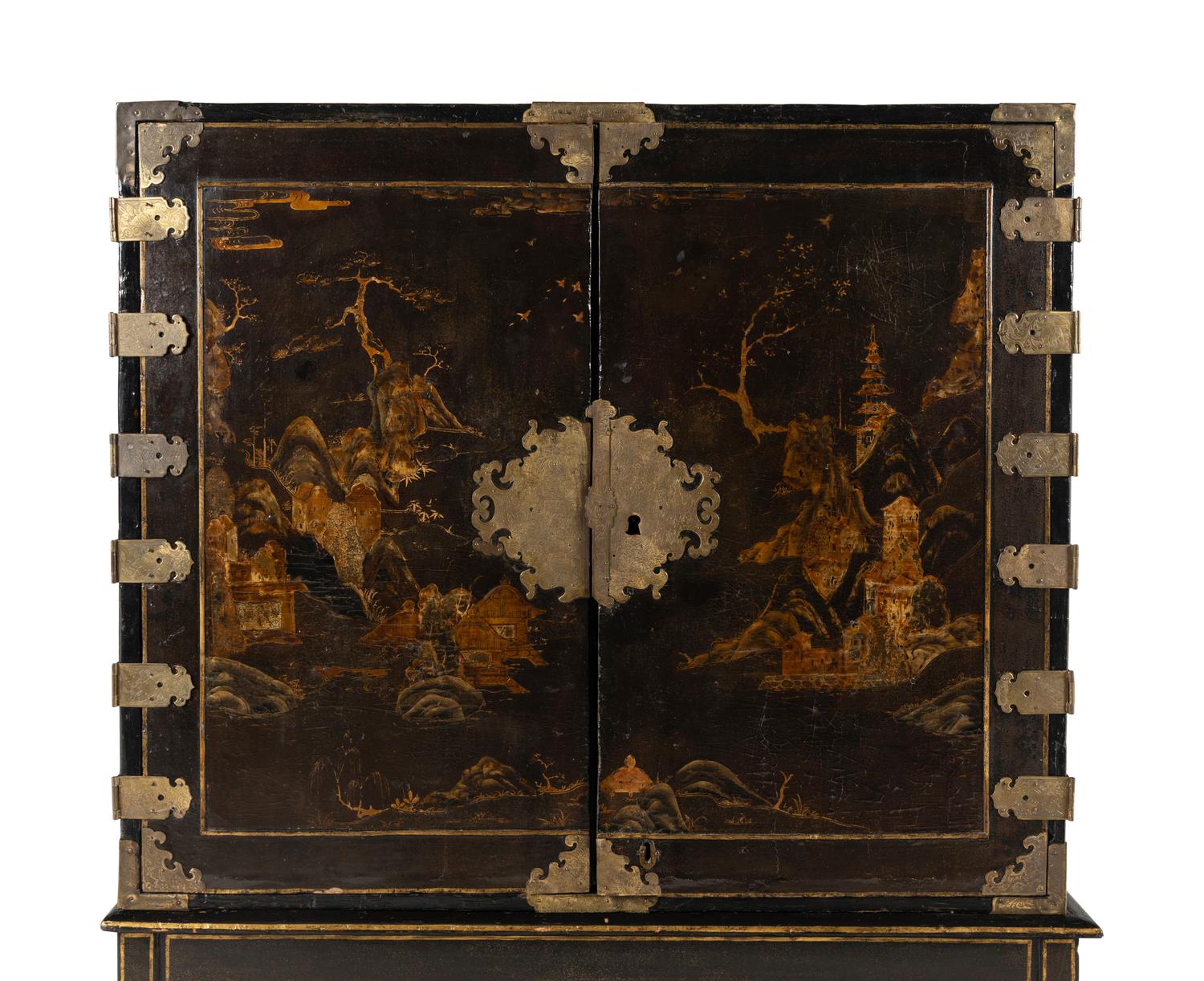 A Japanese Lacquer and Brass Mounted Cabinet on Stand