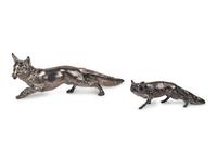 A Pair of Silver Fox-Form Table Ornaments