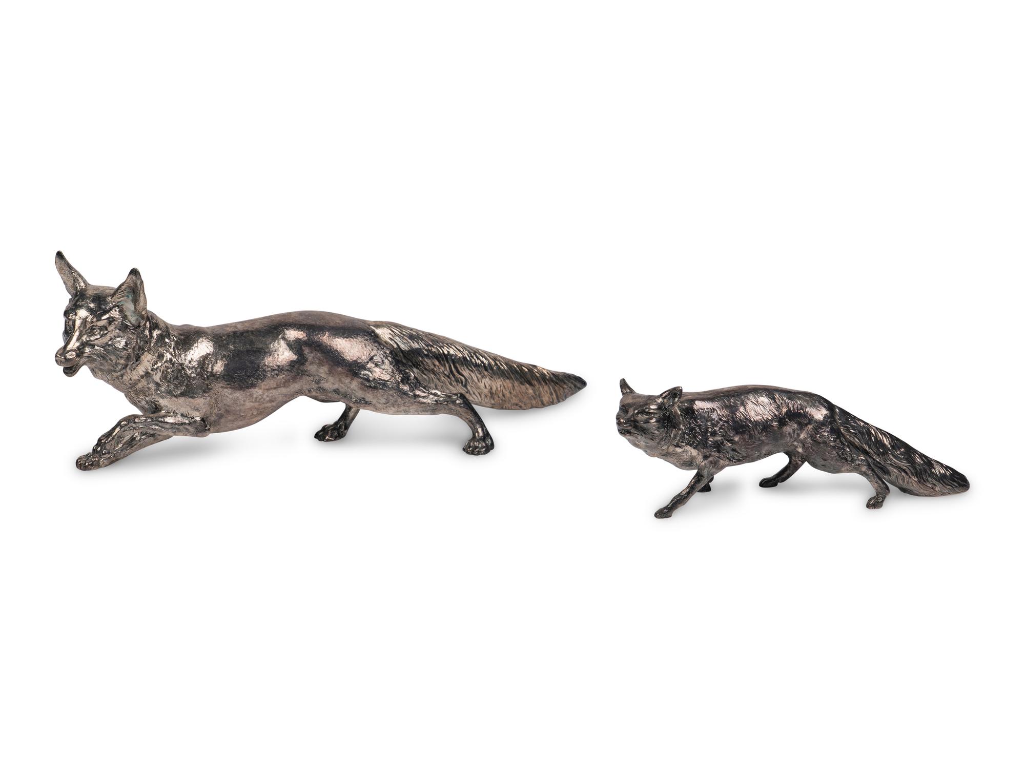 A Pair of Silver Fox-Form Table Ornaments